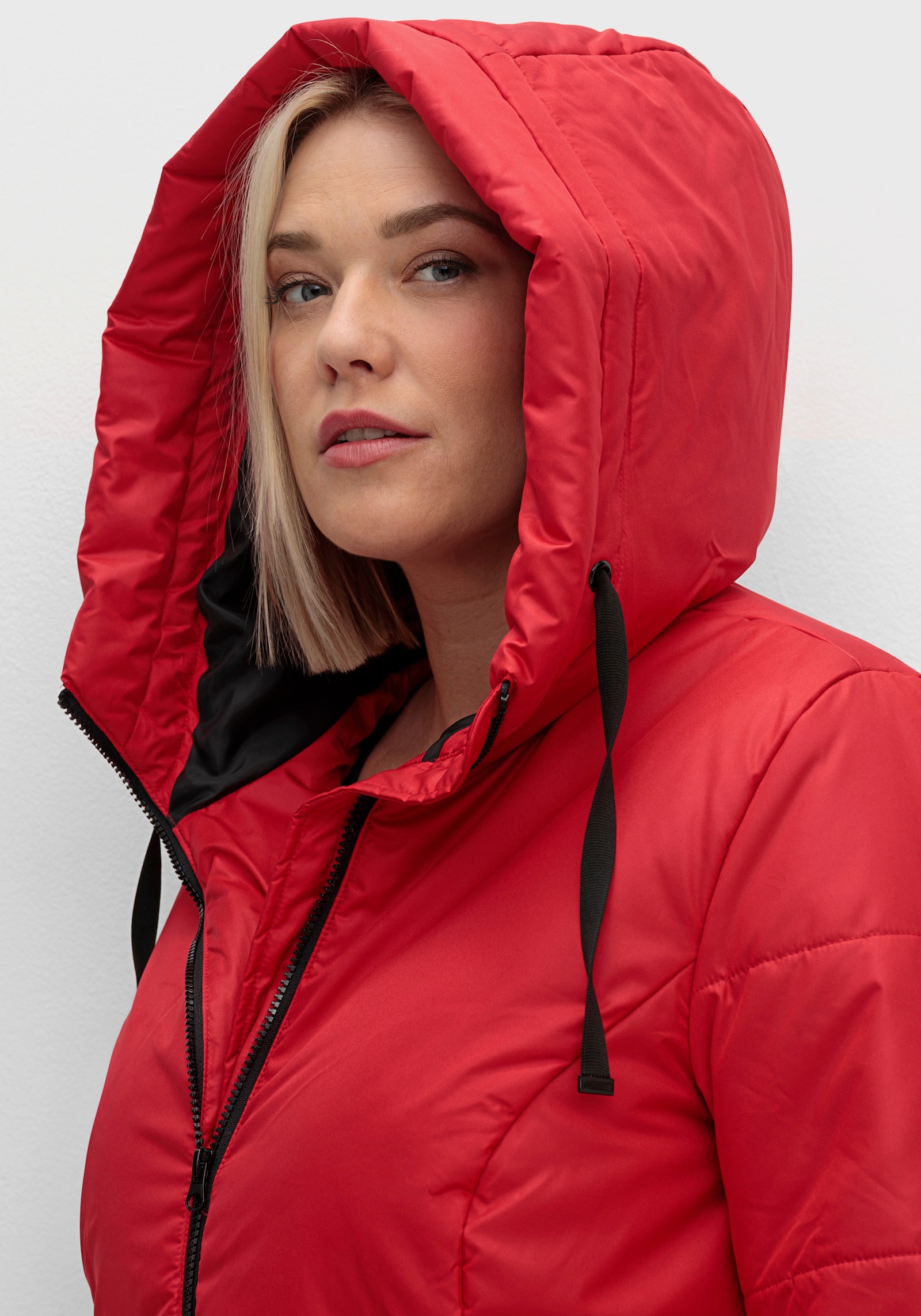 Stark wärmende Longjacke mit Steppmuster - rot