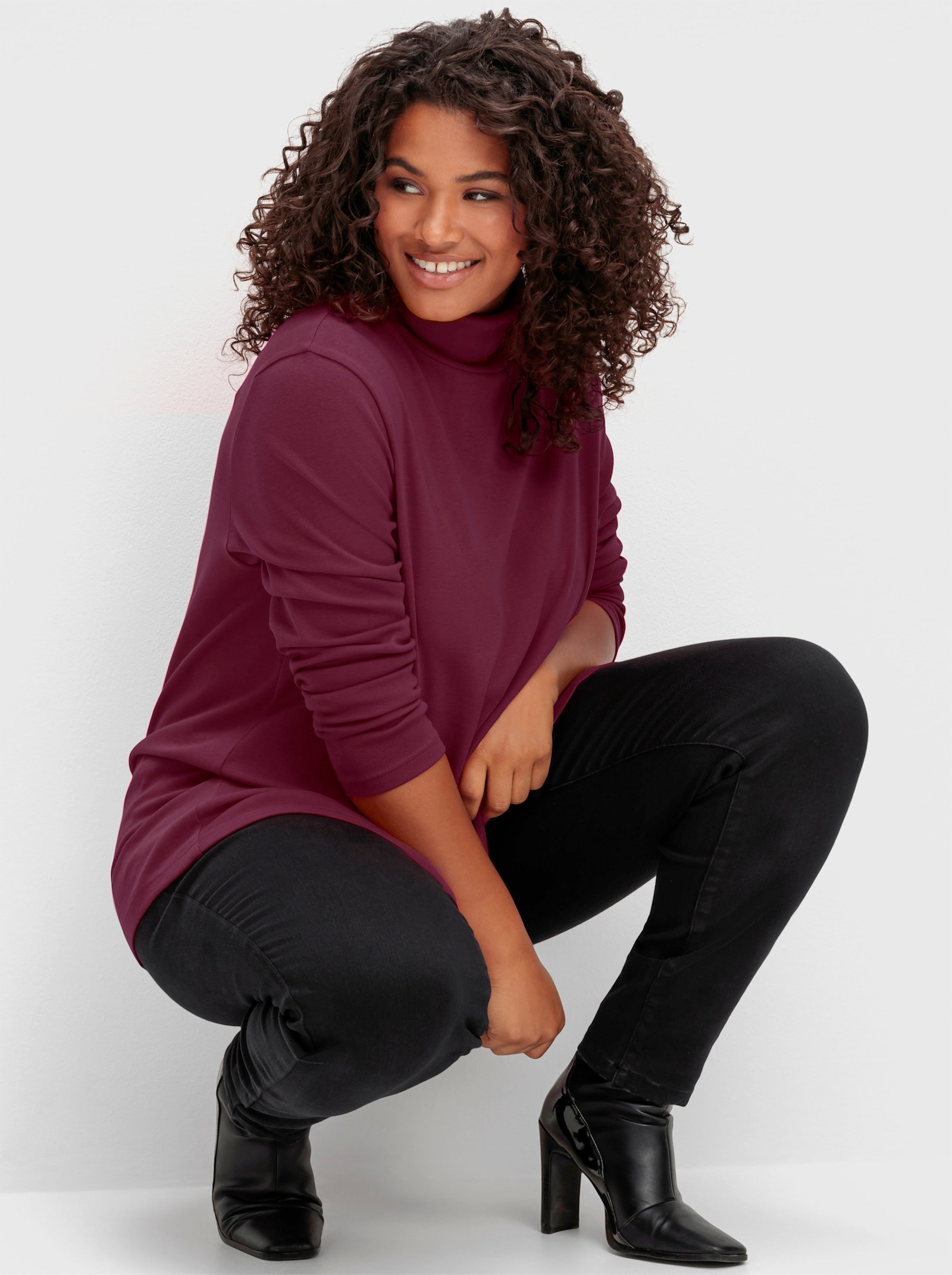 sheego Rollkragenshirt in A-Linie - bordeaux