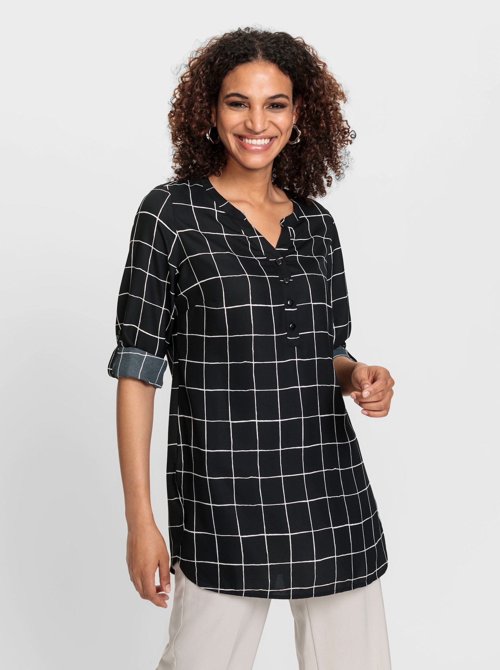 Langarm-Bluse in Longform - schwarz-weiß-kariert