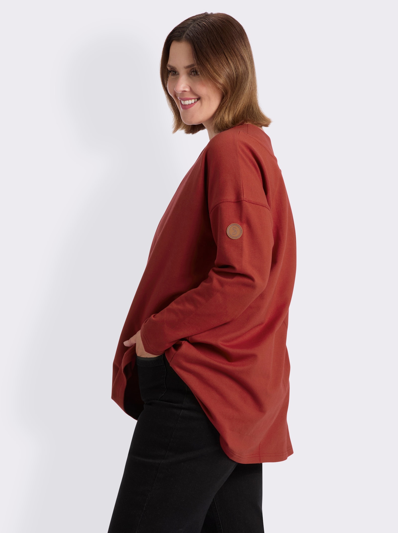 sheego Sweatshirt im schmeichelnden Vokuhila-Schnitt - kirsche