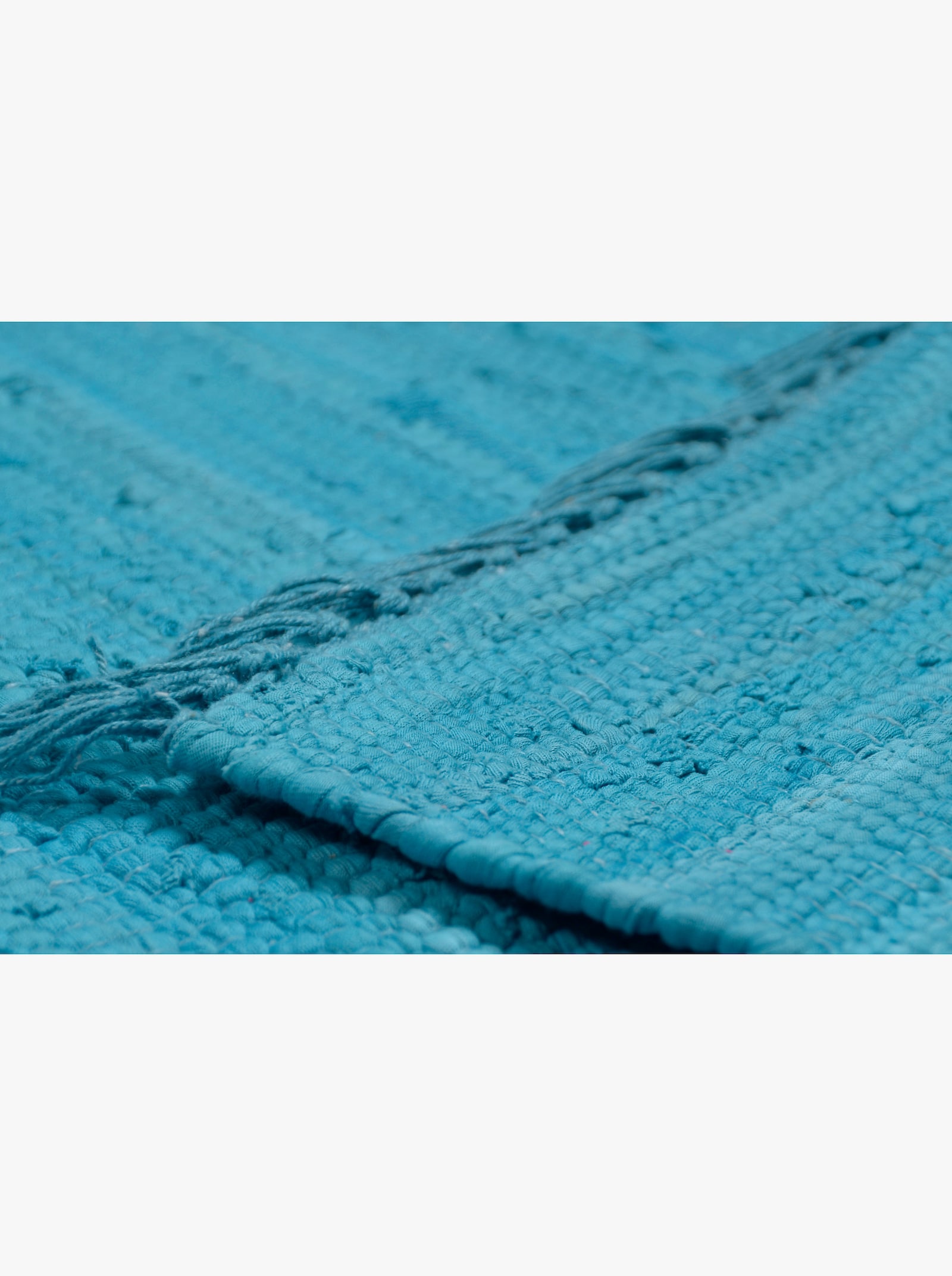 Theko Handwebteppich - türkis