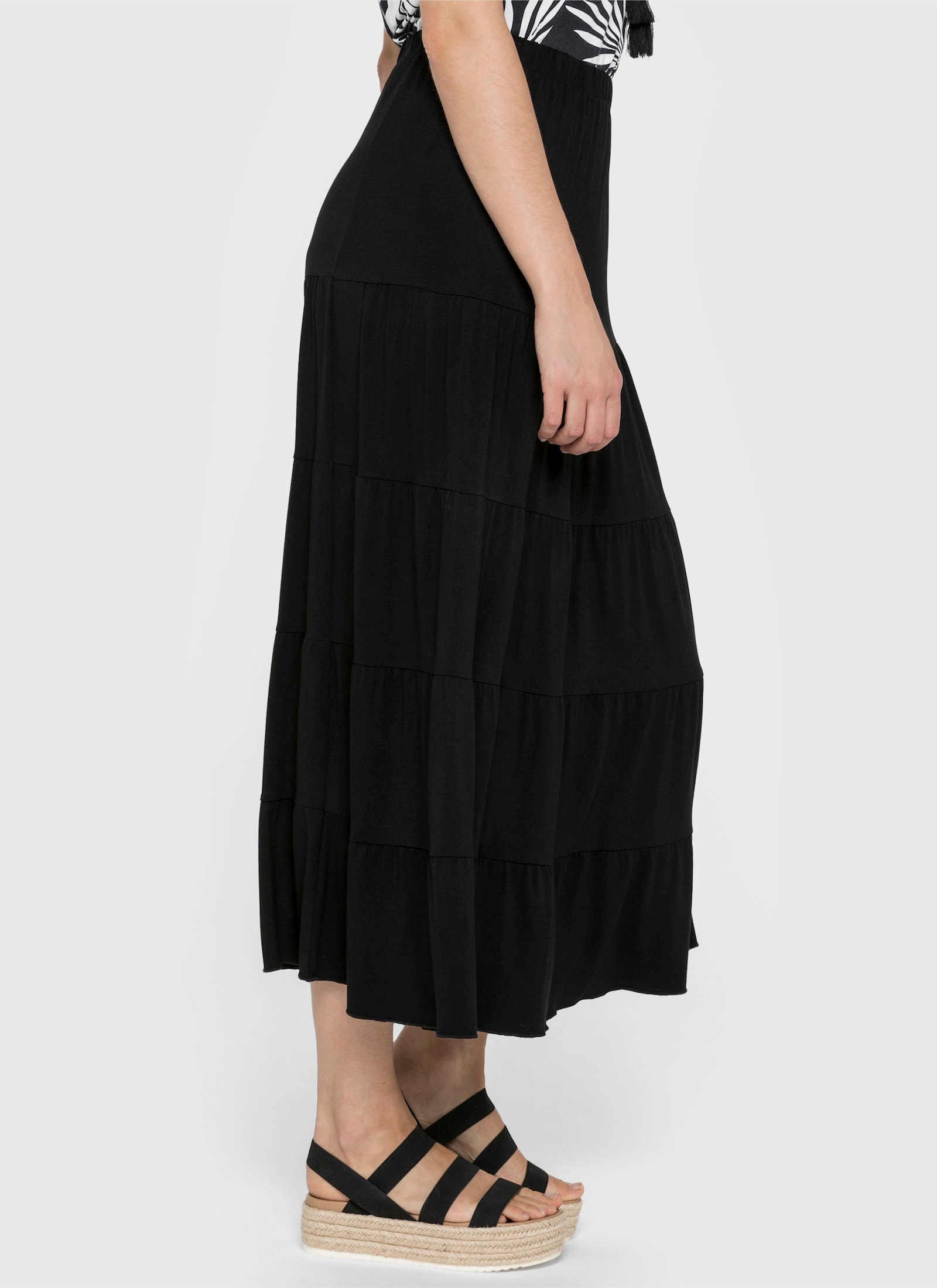 sheego Jerseyrock mit stufigen Volants - schwarz