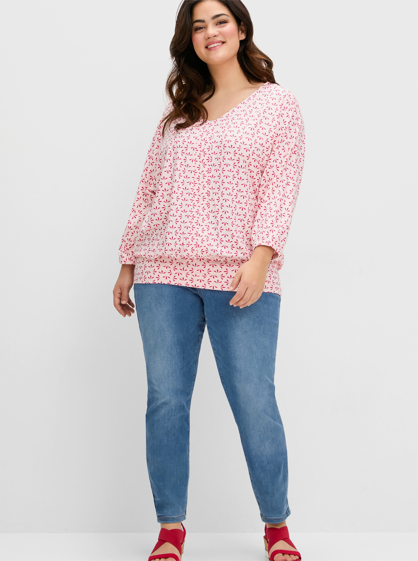 sheego Fledermausshirt mit Minimalprint - blumiges pink-gemustert