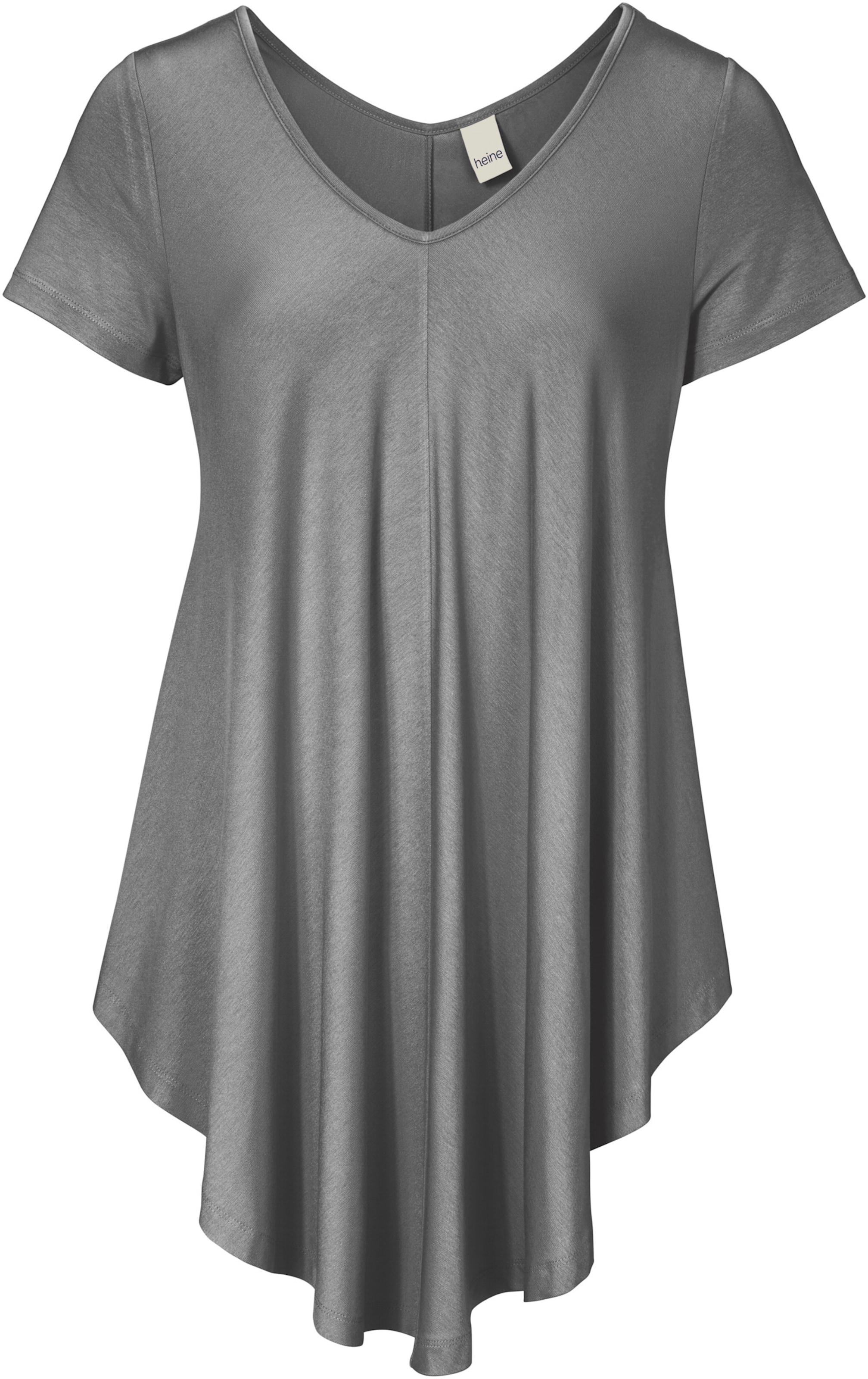 Grau günstig Kaufen-V-Shirt in grau-melange von heine. V-Shirt in grau-melange von heine <![CDATA[V-Shirt Im angesagten Look. Trageangenehmes Material. Figurumspielende Form. In asymmetrischer Form. Mit V-Ausschnitt.]]>. 