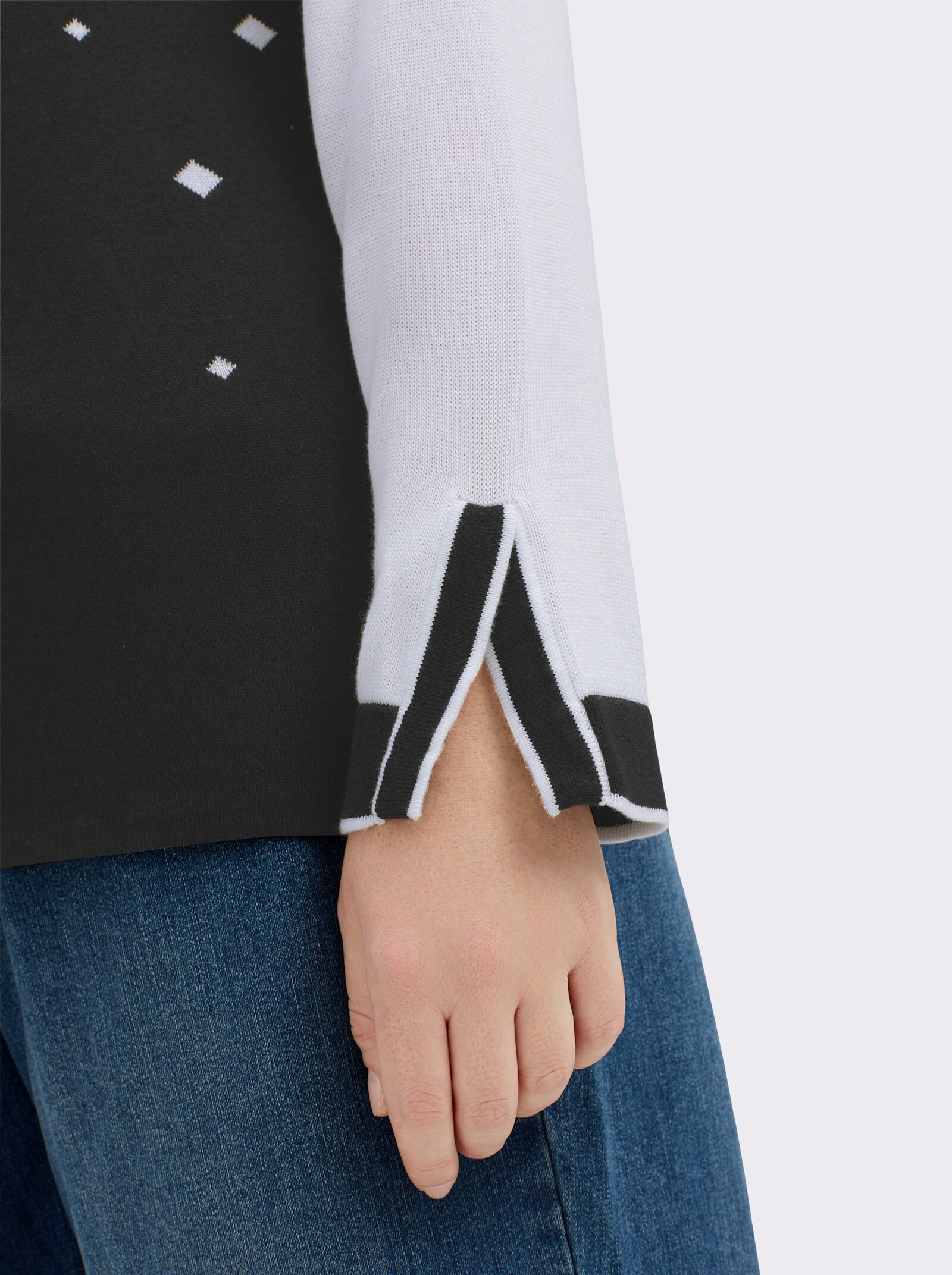 Strickpullover mit geschlitzten Ärmeln - schwarz-weiß