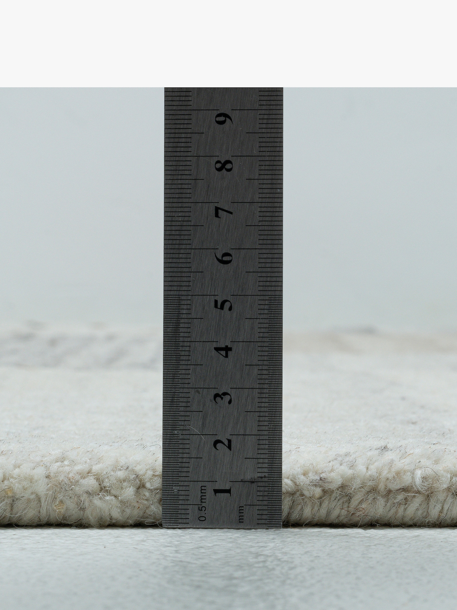 Theko Teppich - natur-grau