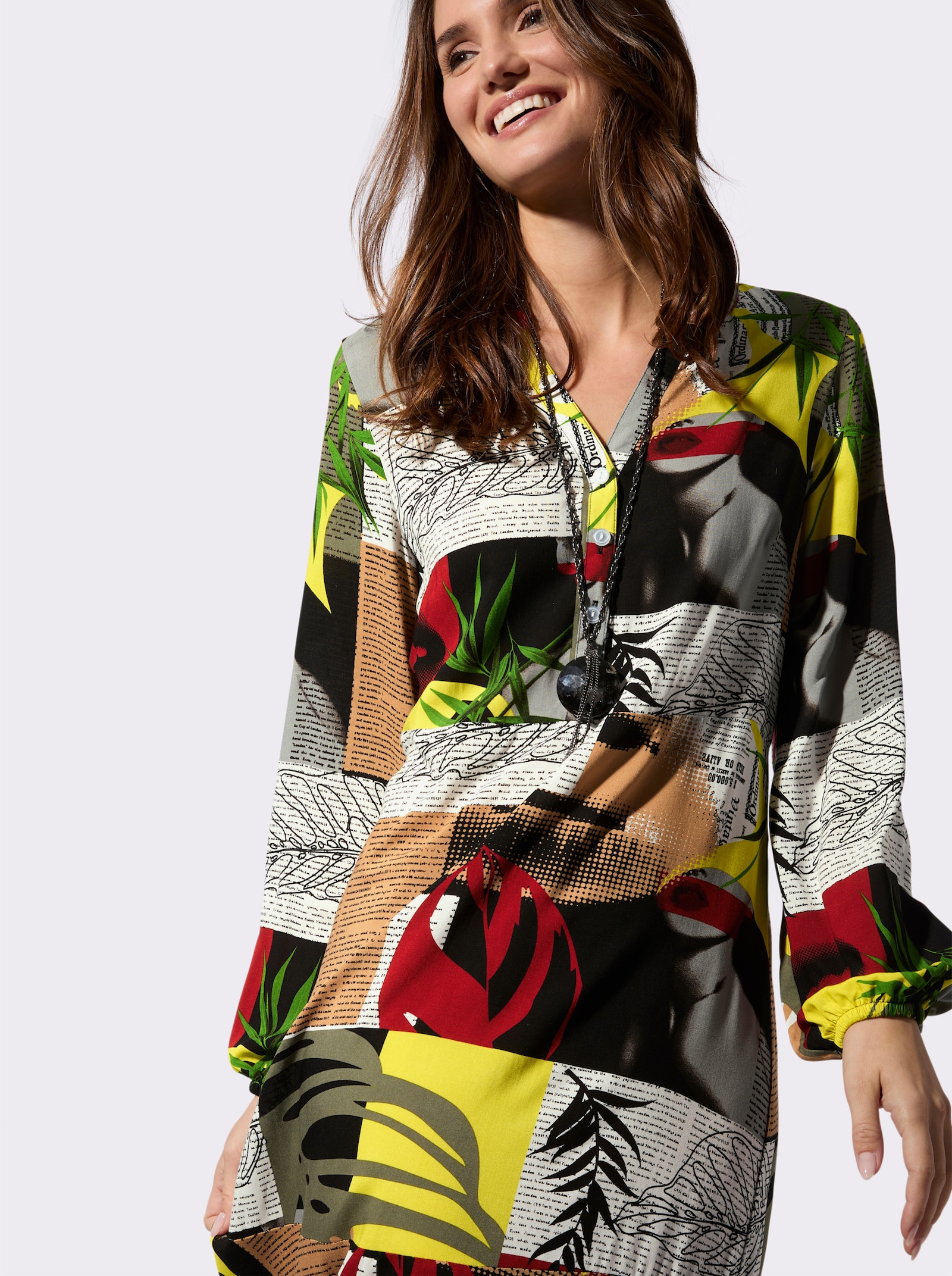 Druckkleid in leichter A.Linie - schwarz-camel-bedruckt