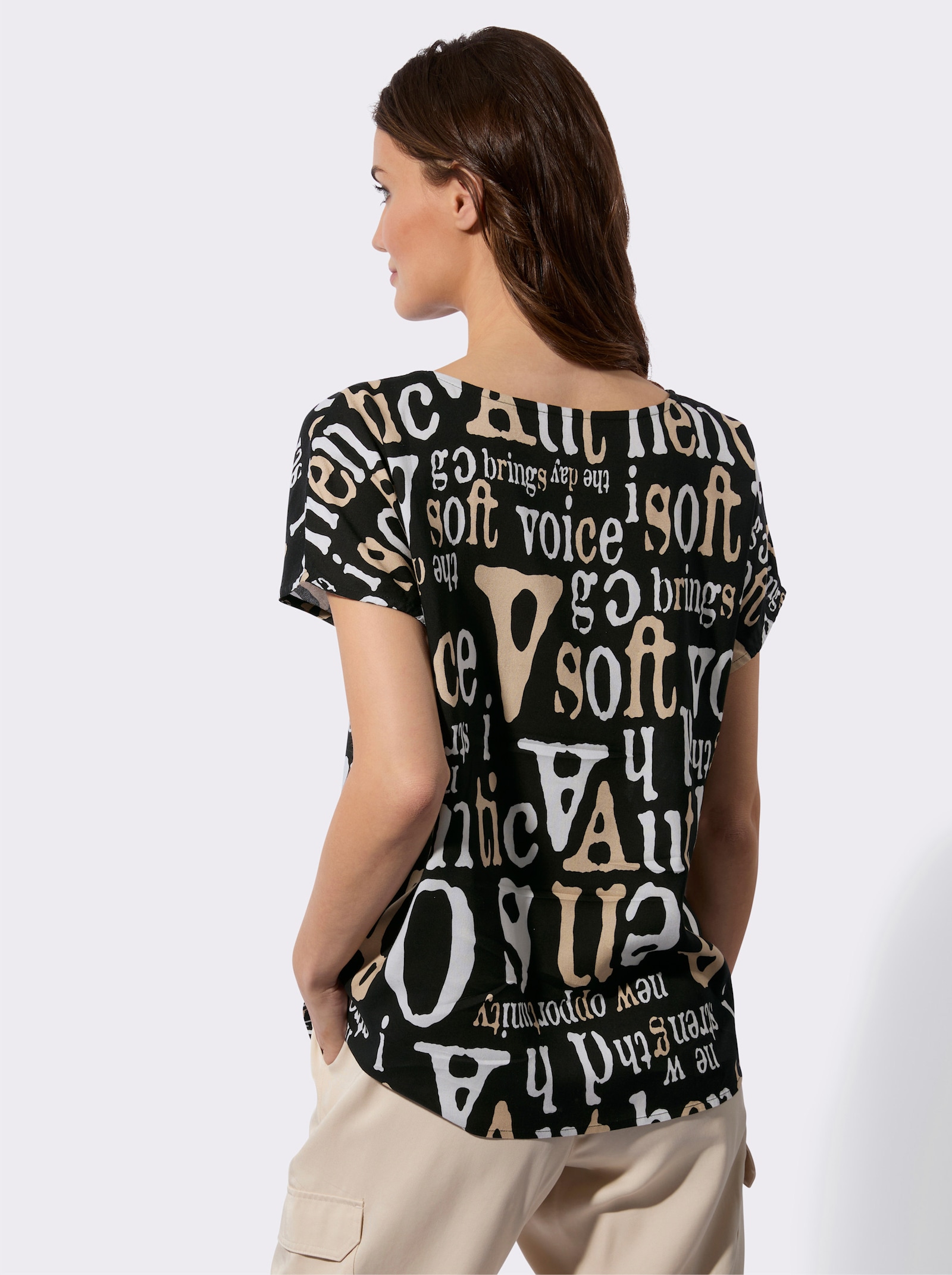 Blus med texttryck - svart-vit, mönstrad