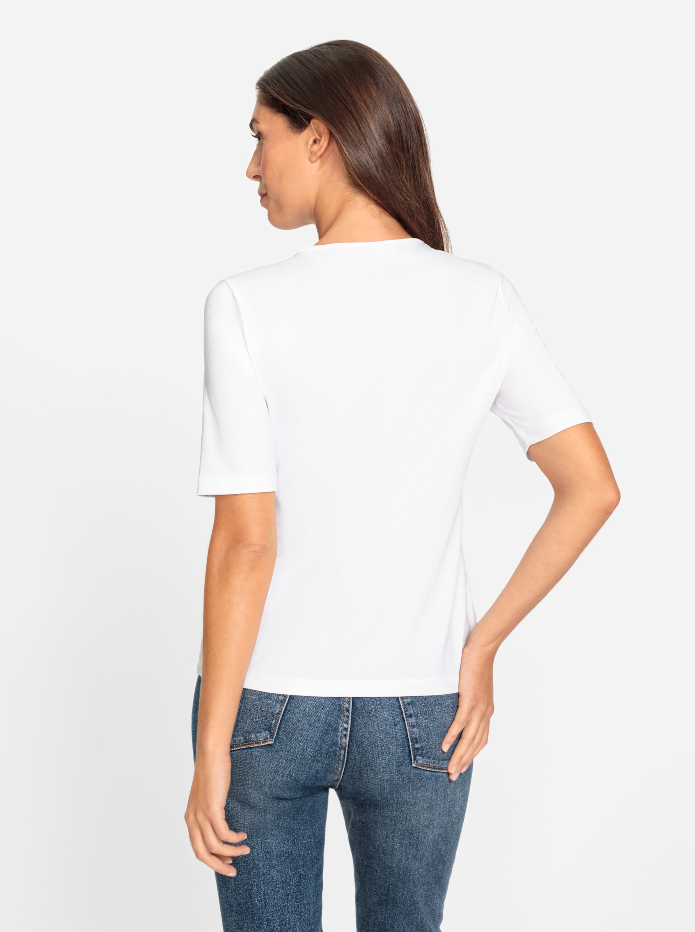 Figur von günstig Kaufen-Shirt in weiß von heine. Shirt in weiß von heine <![CDATA[Shirt Mit raffiniertem Cut-outs am Ausschnitt und etwas längerem Halbarm. Angenehme, knitterarme Tactel-Qualität. Figurbetonter Schnitt.]]>. 