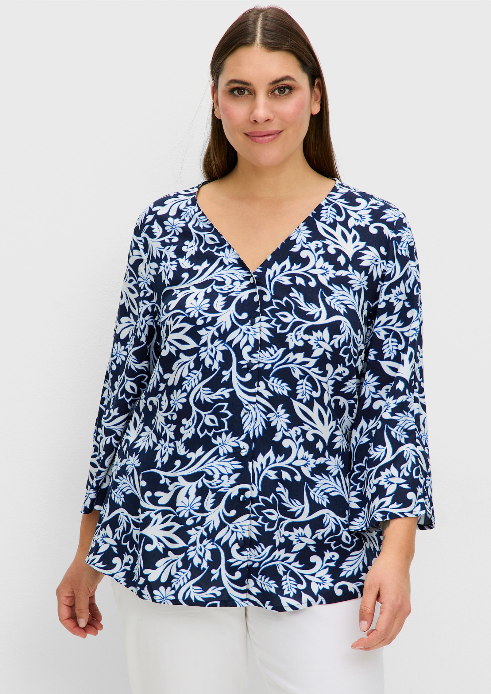 sheego Druckbluse mit 3/4-Trompetenärmeln - tiefblau-gemustert