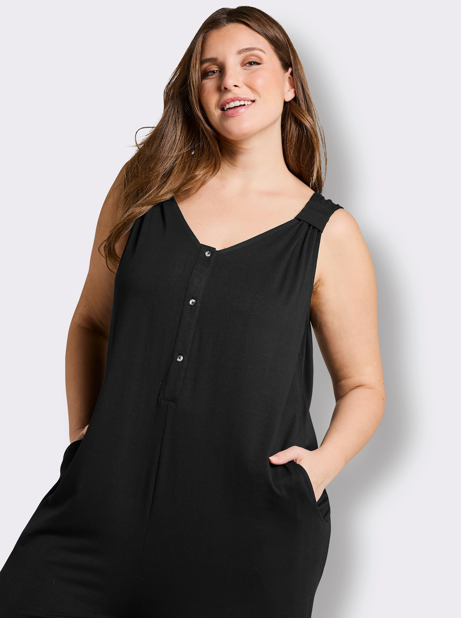 sheego Jumpsuit mit kurzer Knopfleiste - schwarz