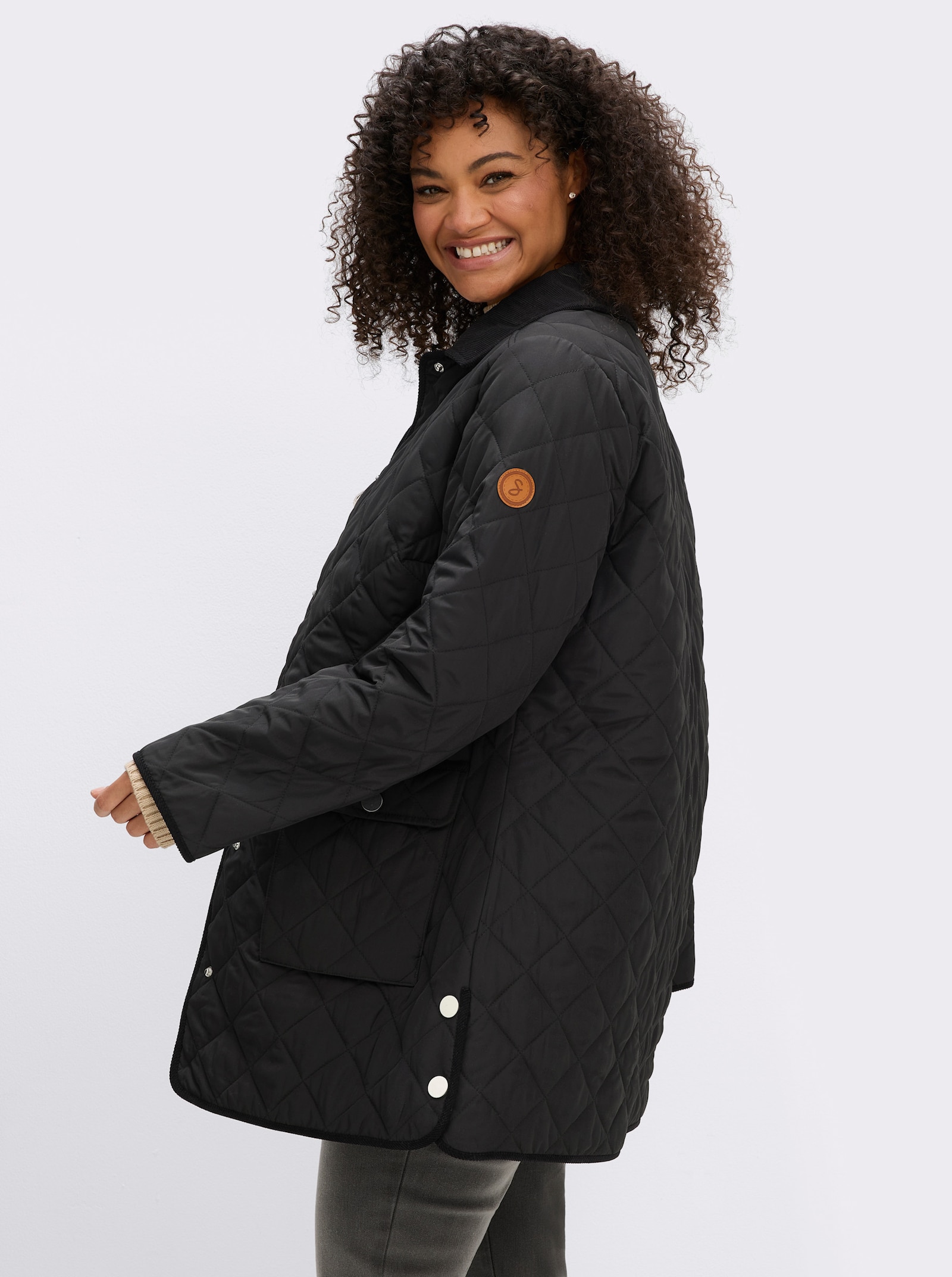 sheego Steppjacke mit Cord-Akzenten - schwarz