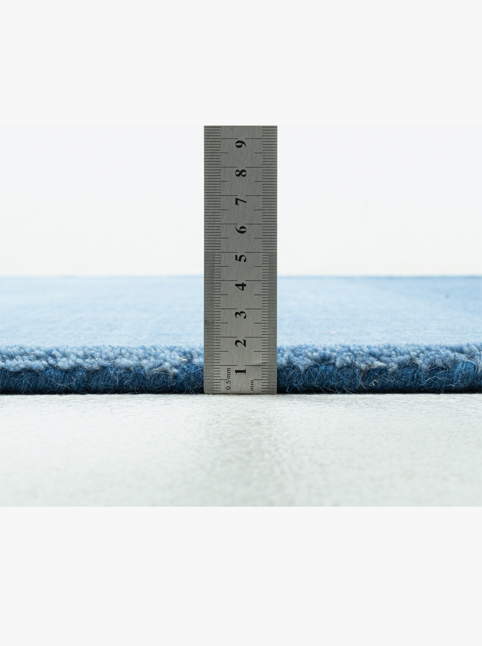 Theko Handwebteppich - blau