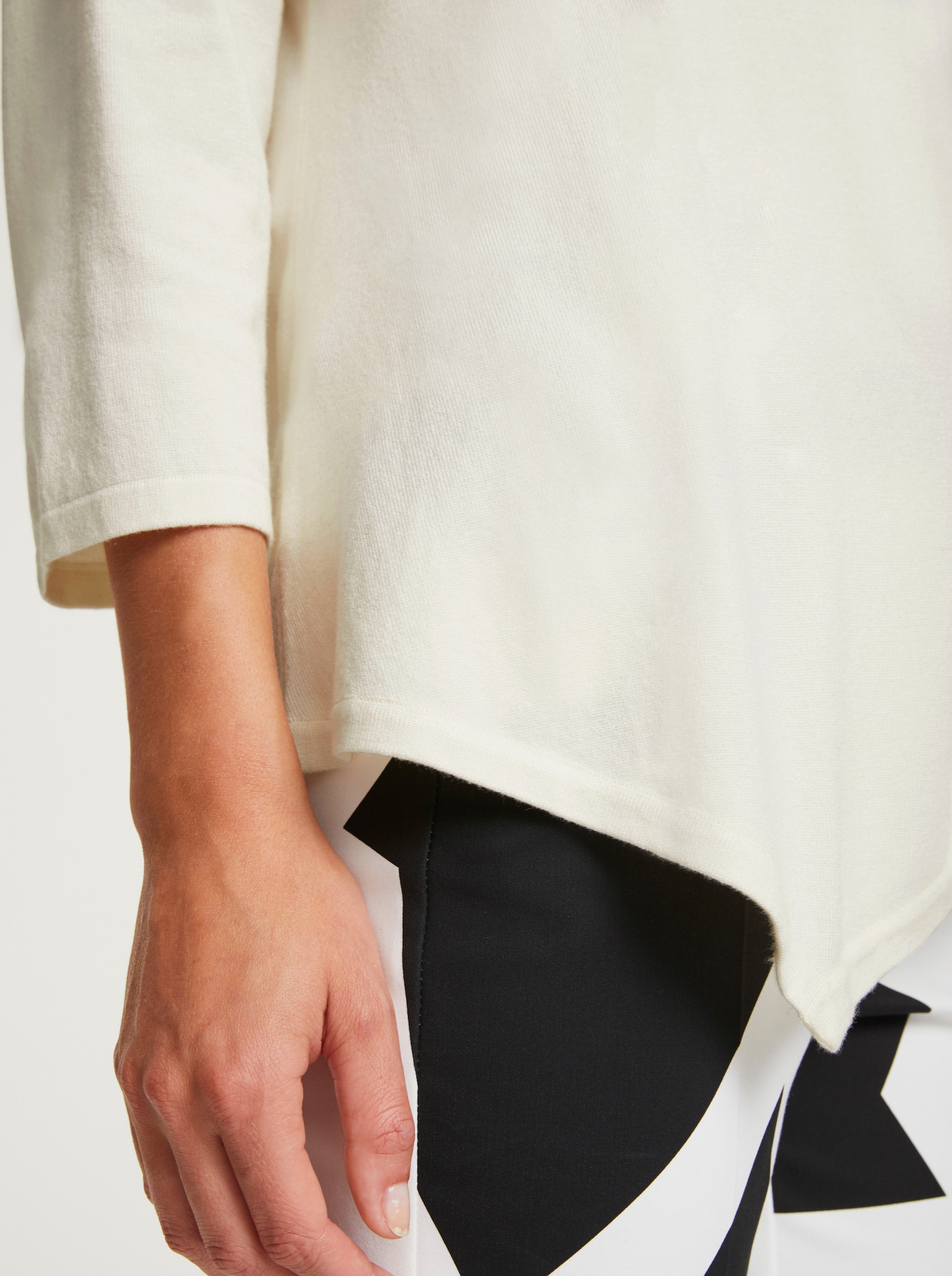 heine V-Ausschnitt-Pullover mit spitz zulaufendem Saum - ecru