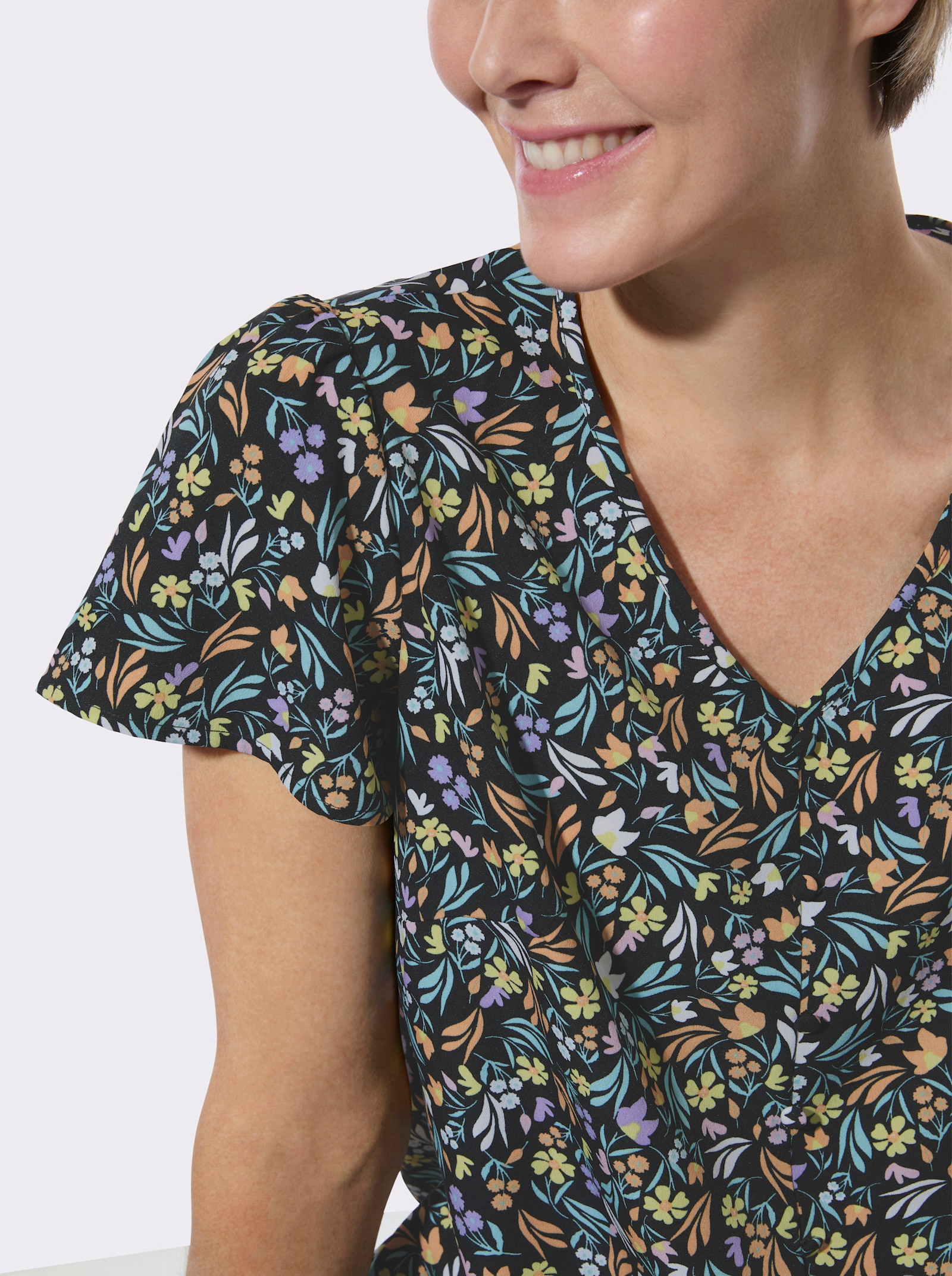 Schlupfbluse mit floralem Muster - schwarz-apricot-bedruckt