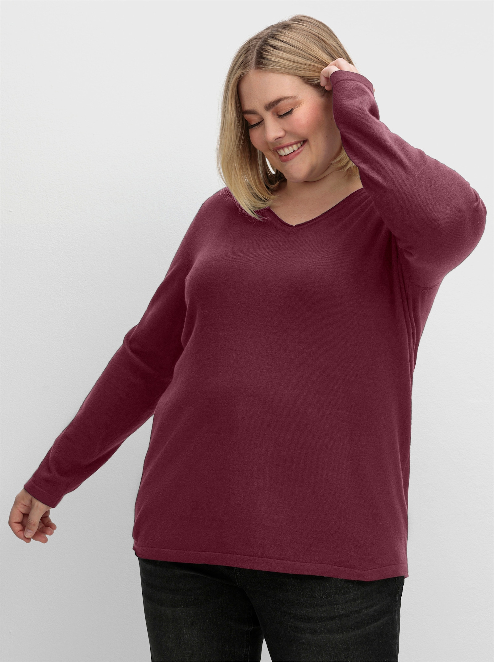 sheego Pullover met V-hals van fluweelzacht materiaal - bordeaux
