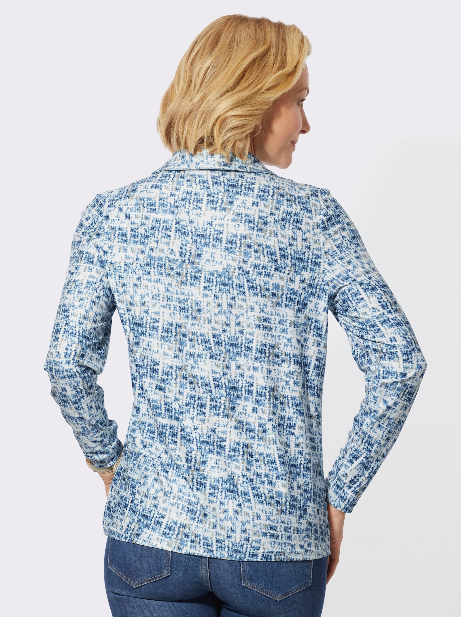 Poloshirt van licht opgeruwd wintermateriaal - ecru/middenblauw bedrukt