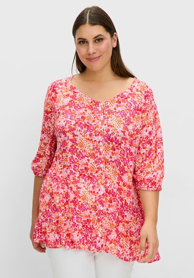 sheego Druckbluse in Crêpe-Qualität, mit Volant am Saum - pink gemustert