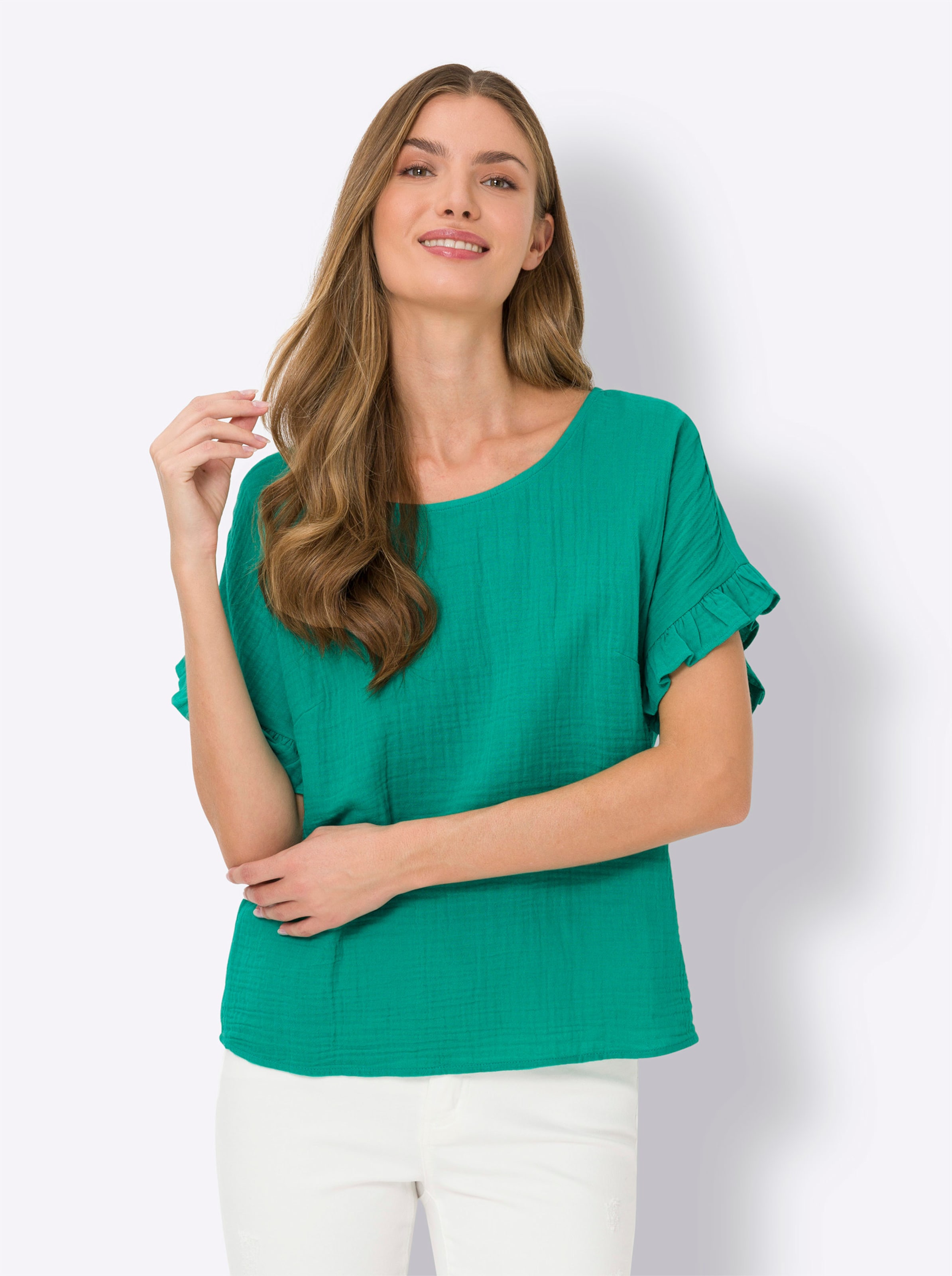 LTE SMA günstig Kaufen-Bluse in smaragd von heine. Bluse in smaragd von heine <![CDATA[Bluse Aus feinem Musselin. Mit Rundhals-Ausschnitt, überschnittener Schulter, Rüschen am Kurzarm und Brustabnähern. Unterstützt die Initiative Cotton made in Africa.]]>. 