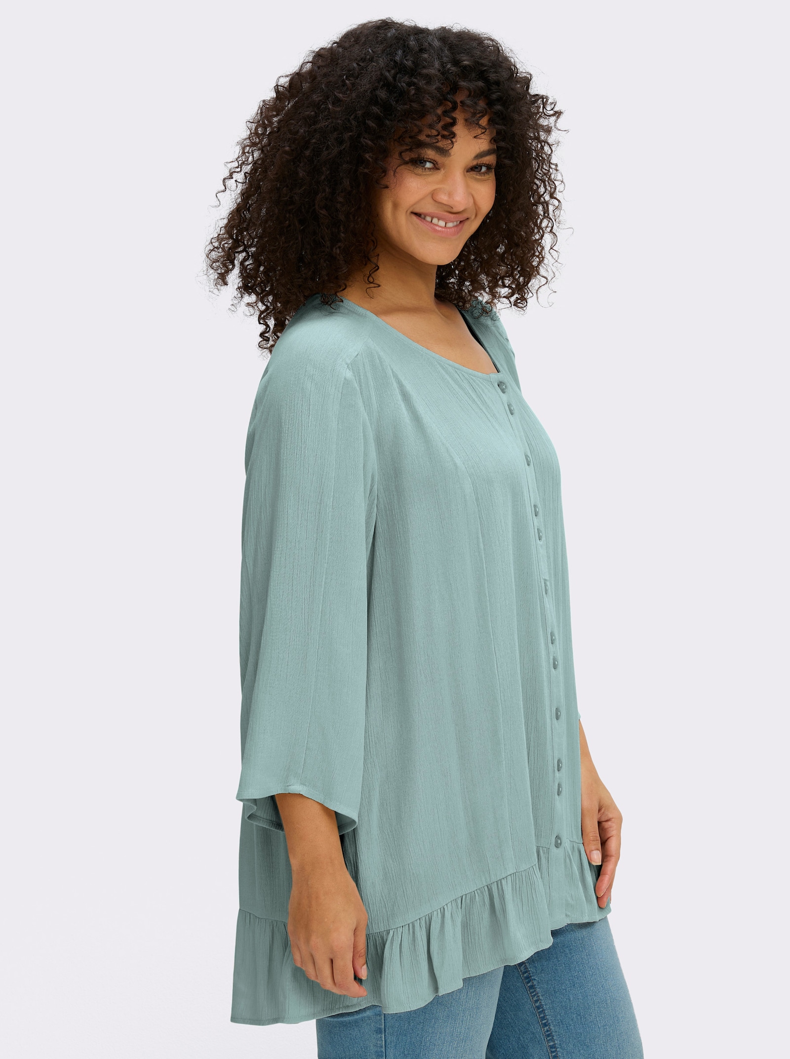 sheego Crinklebluse mit Volant am Saum - kalkmint