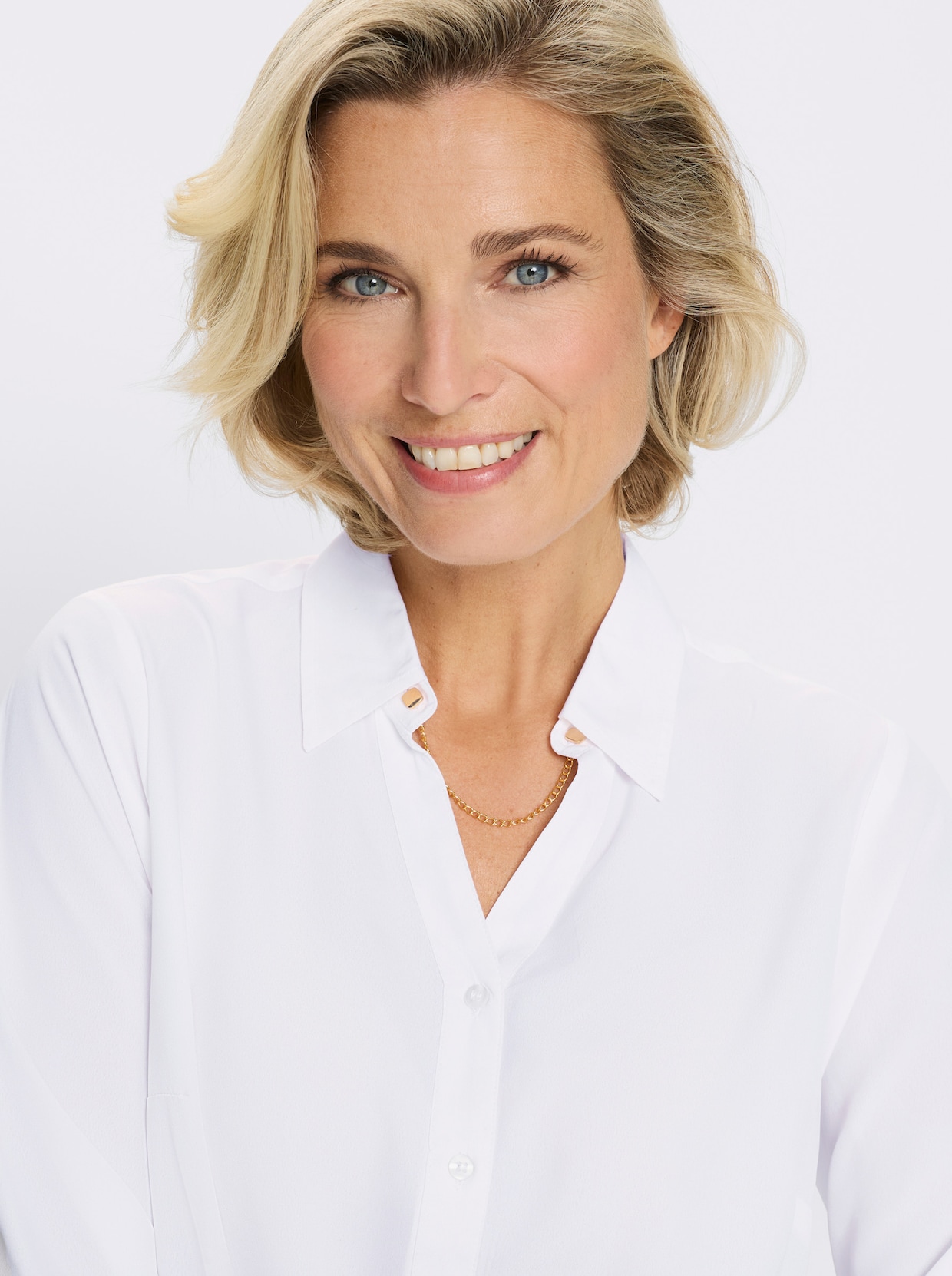 Langarmbluse mit goldfarbener Zierkette - ecru