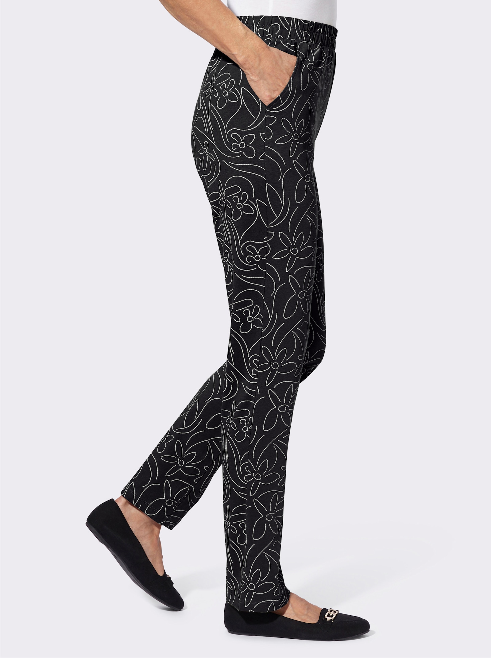 Freizeithose mit Blumen-Druck - schwarz-sand-bedruckt