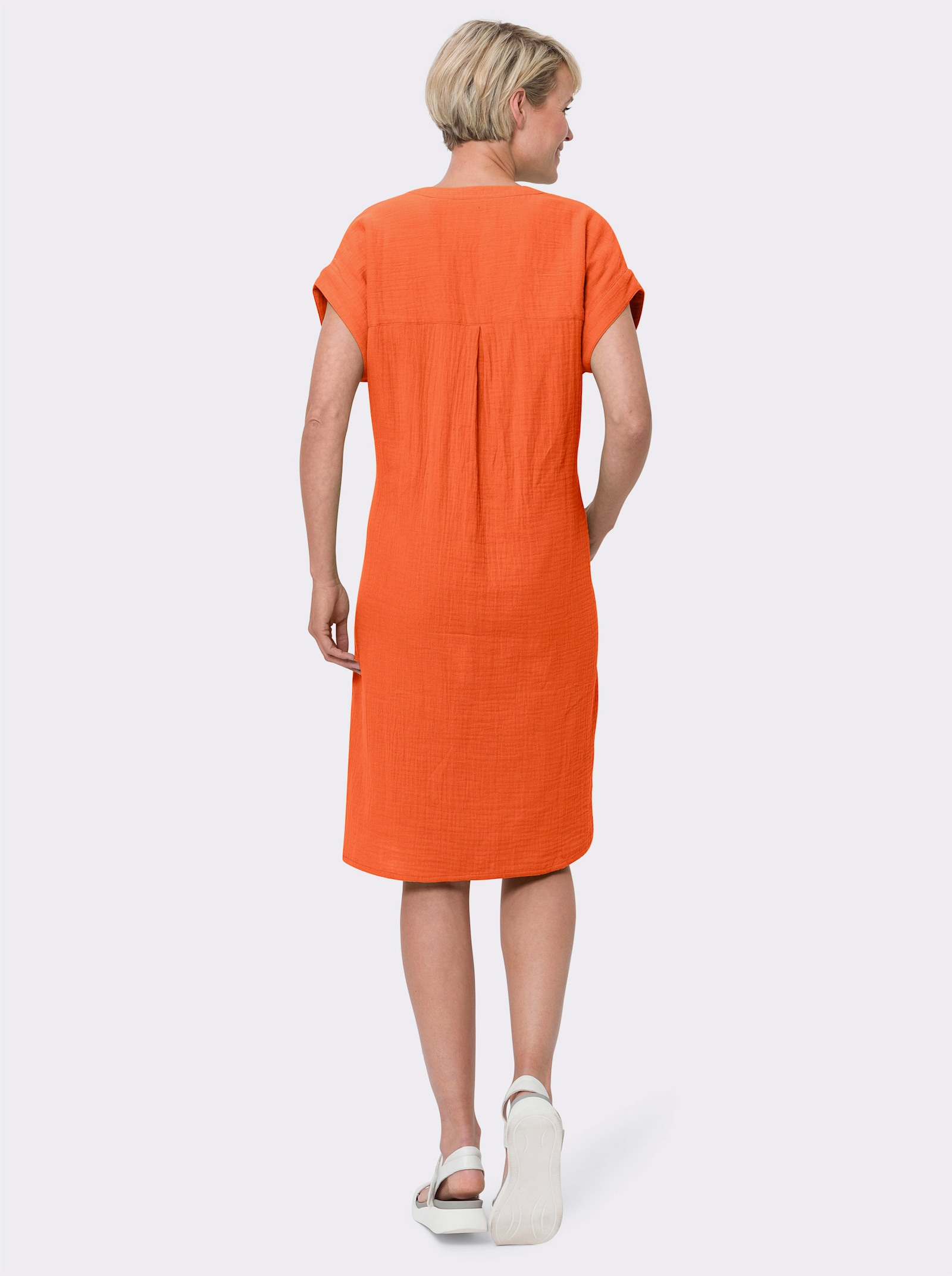 Bomullsklänning i muslinmaterial - orange