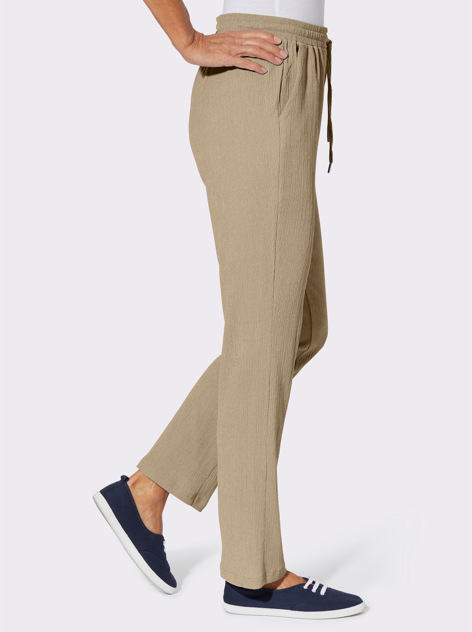 Byxa med resår i krinklat material - beige