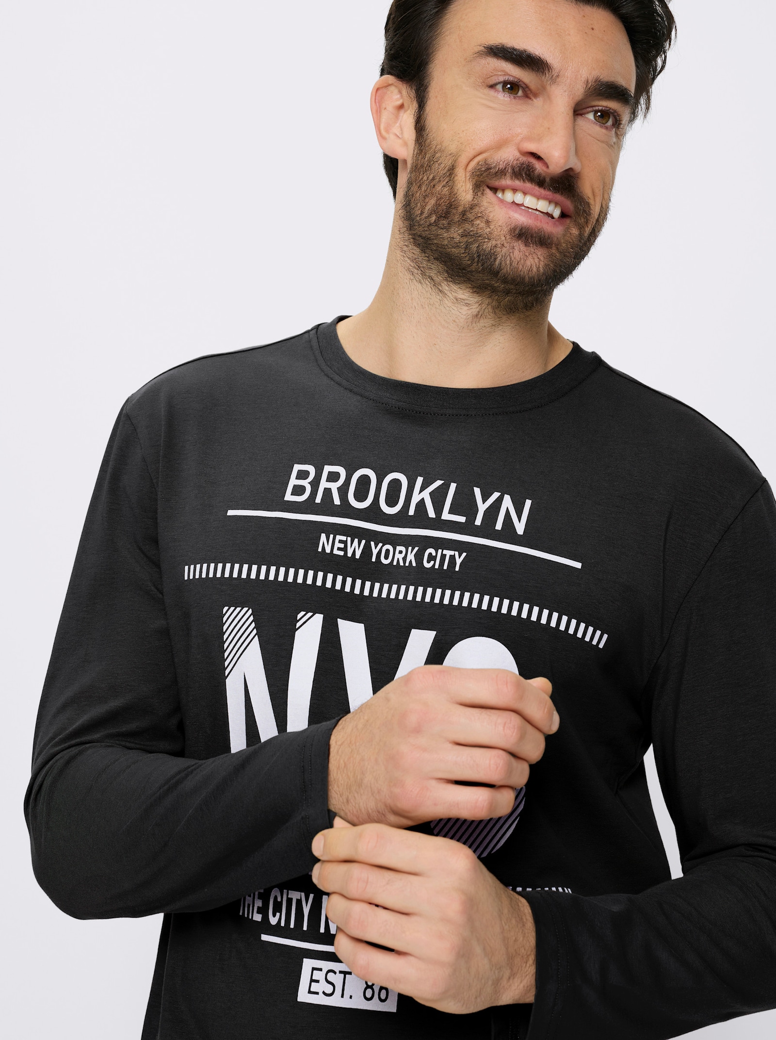 Catamaran Sports Freizeitshirt mit platziertem Druck - schwarz-weiß-bedruckt