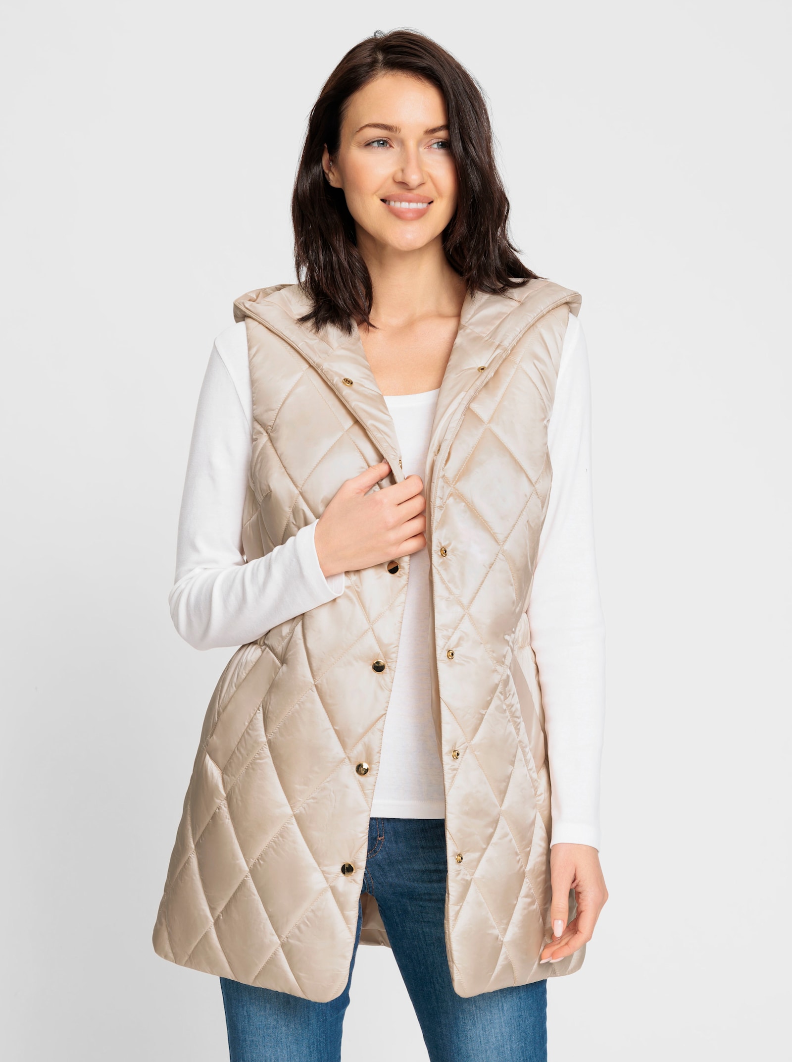 Bodywarmer in lang model - ivoorkleur