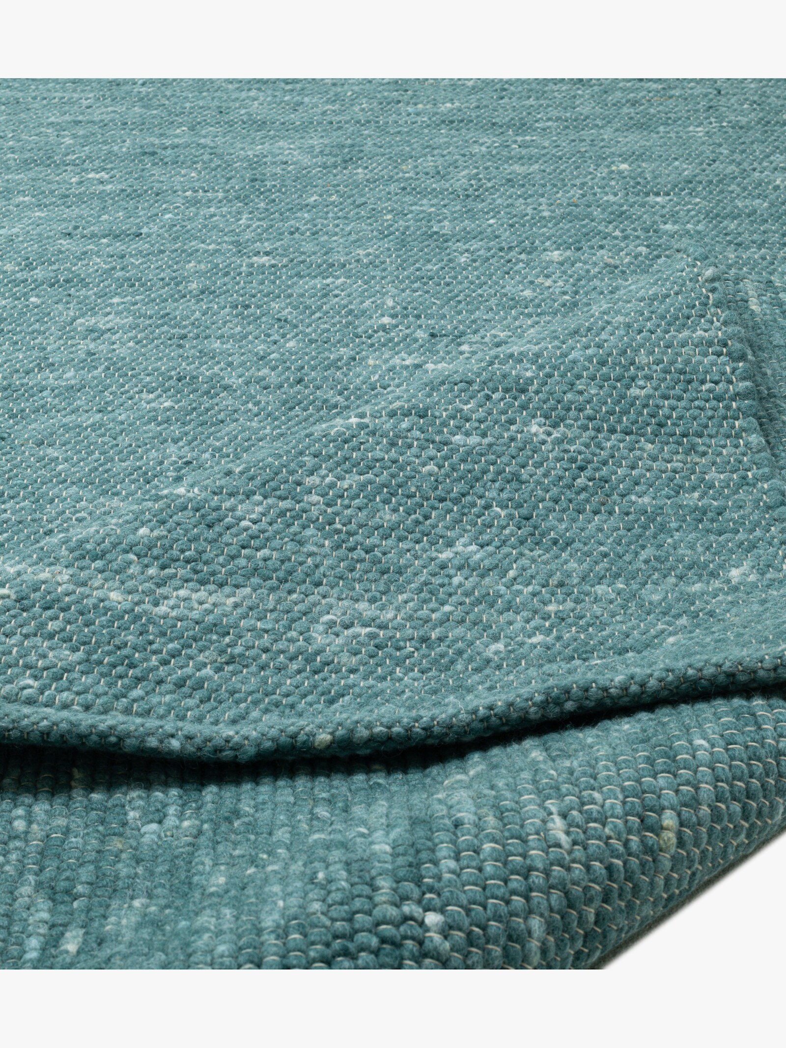 Theko Handwebteppich - petrol