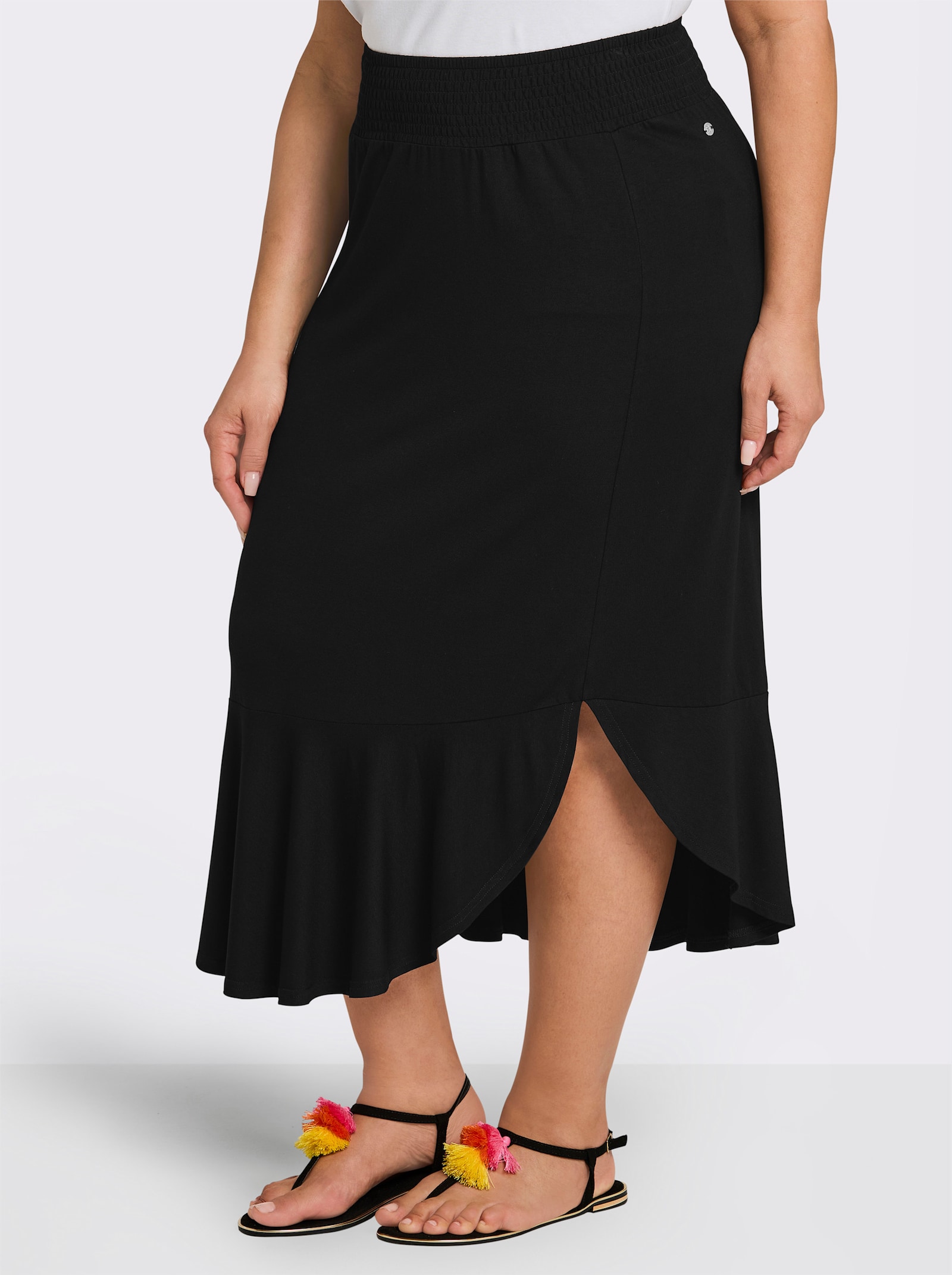 sheego Schlupfrock mit asymmetrischem Saum - schwarz