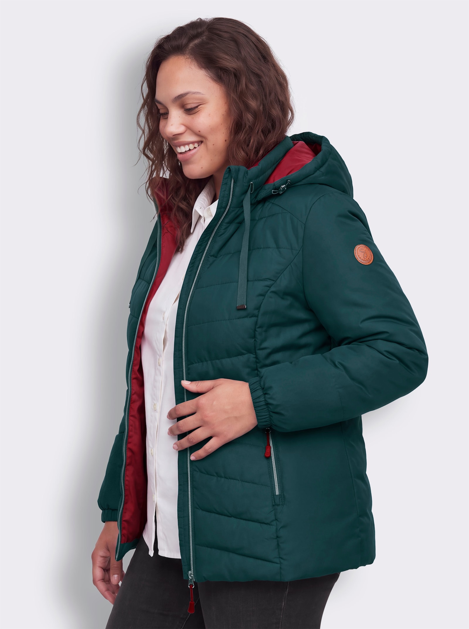 sheego Outdoorjacke mit schmeichelndem V-Steppmuster - aquapetrol