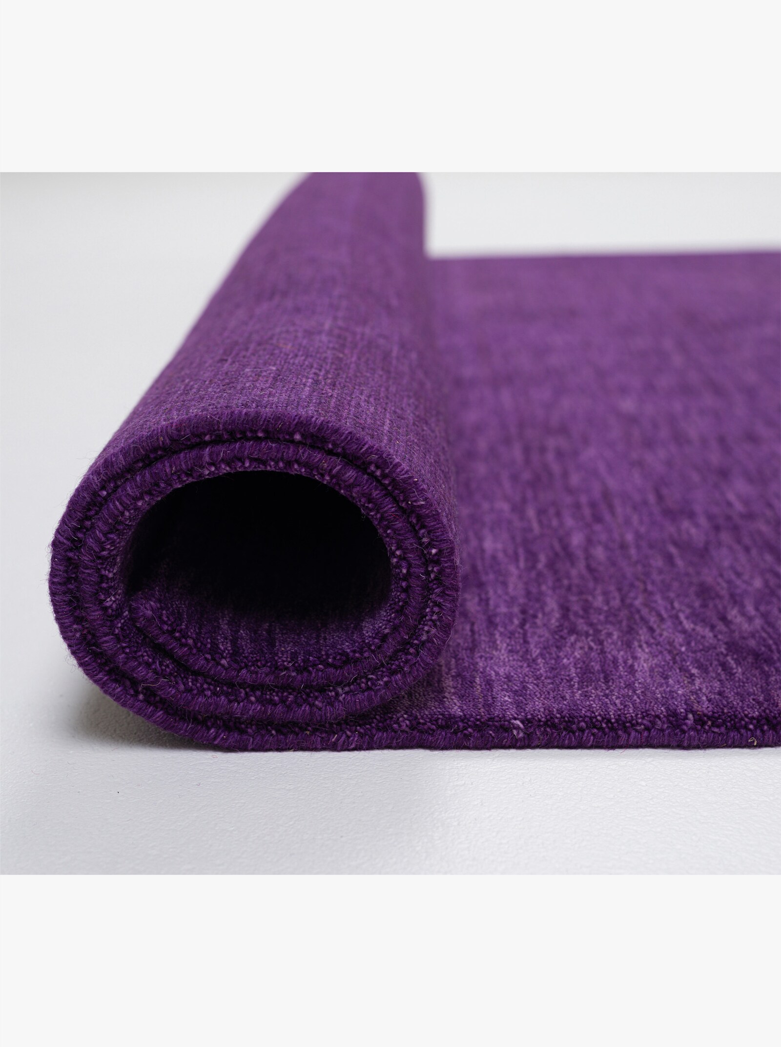 Theko Handwebteppich - lila