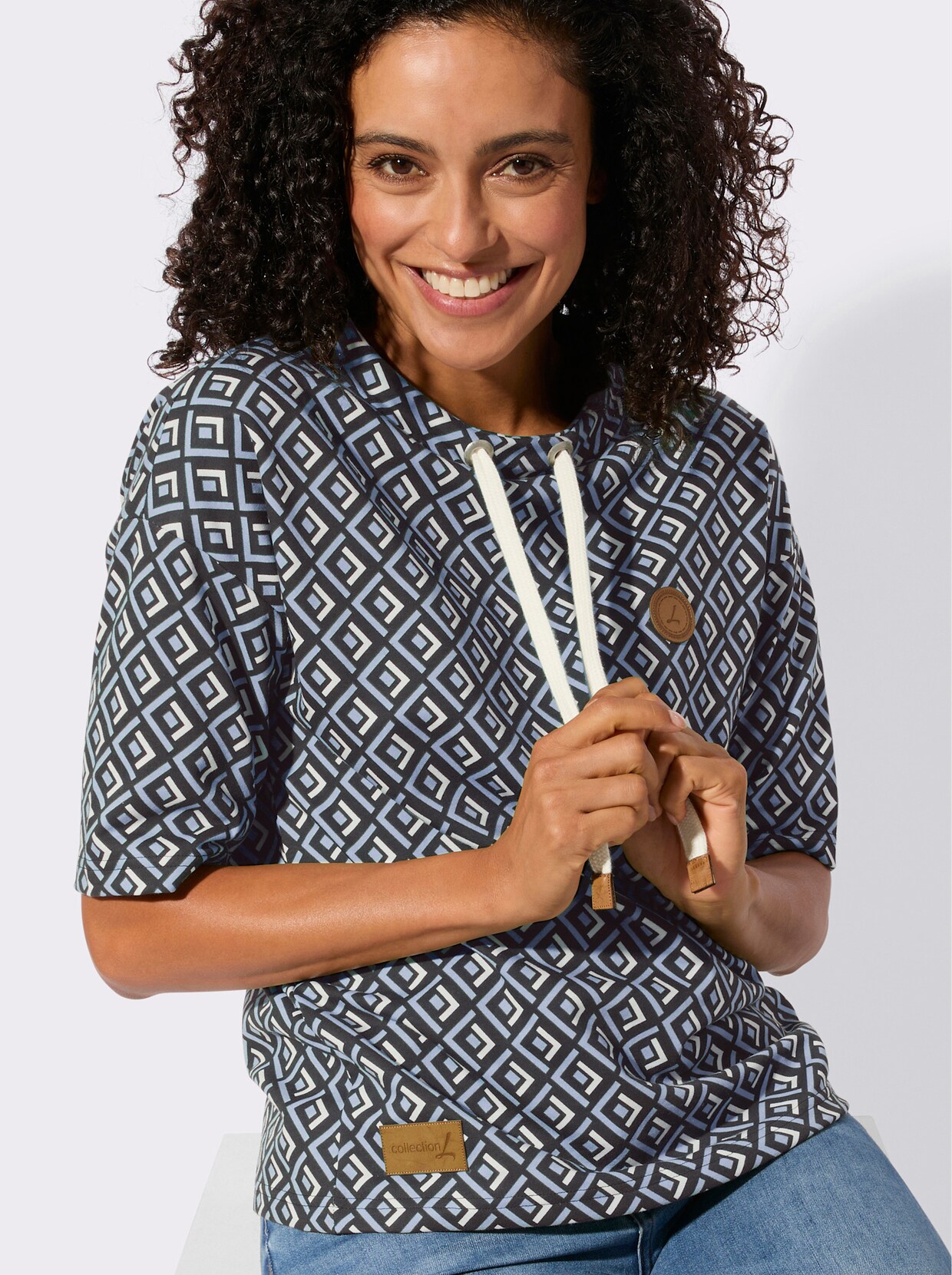 Sweatshirt im Druckmuster - eisblau-schwarz-gemustert