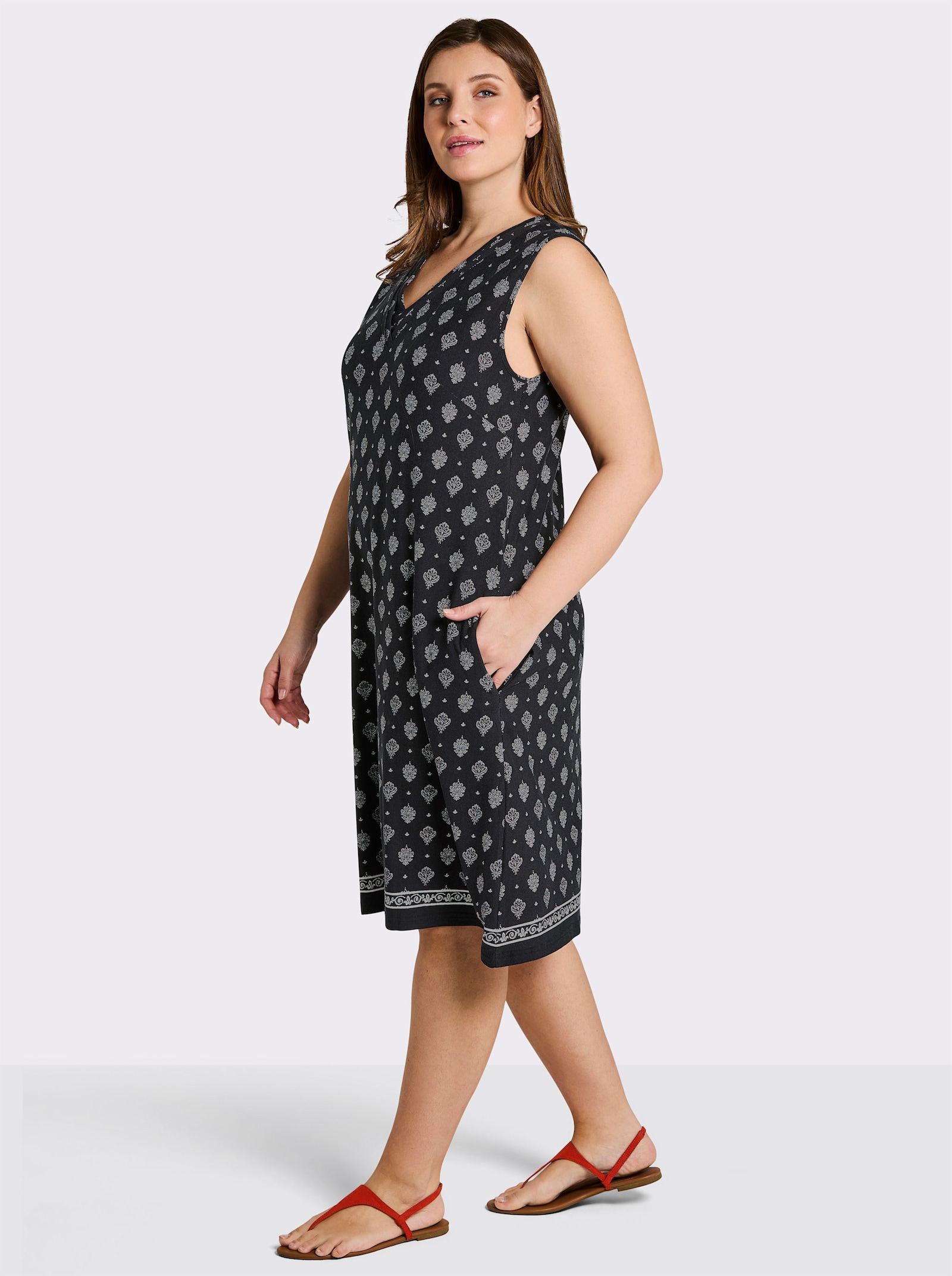 sheego Jerseykleid mit Ornamentprint, in A-Linie - schwarz-ecru-bedruckt