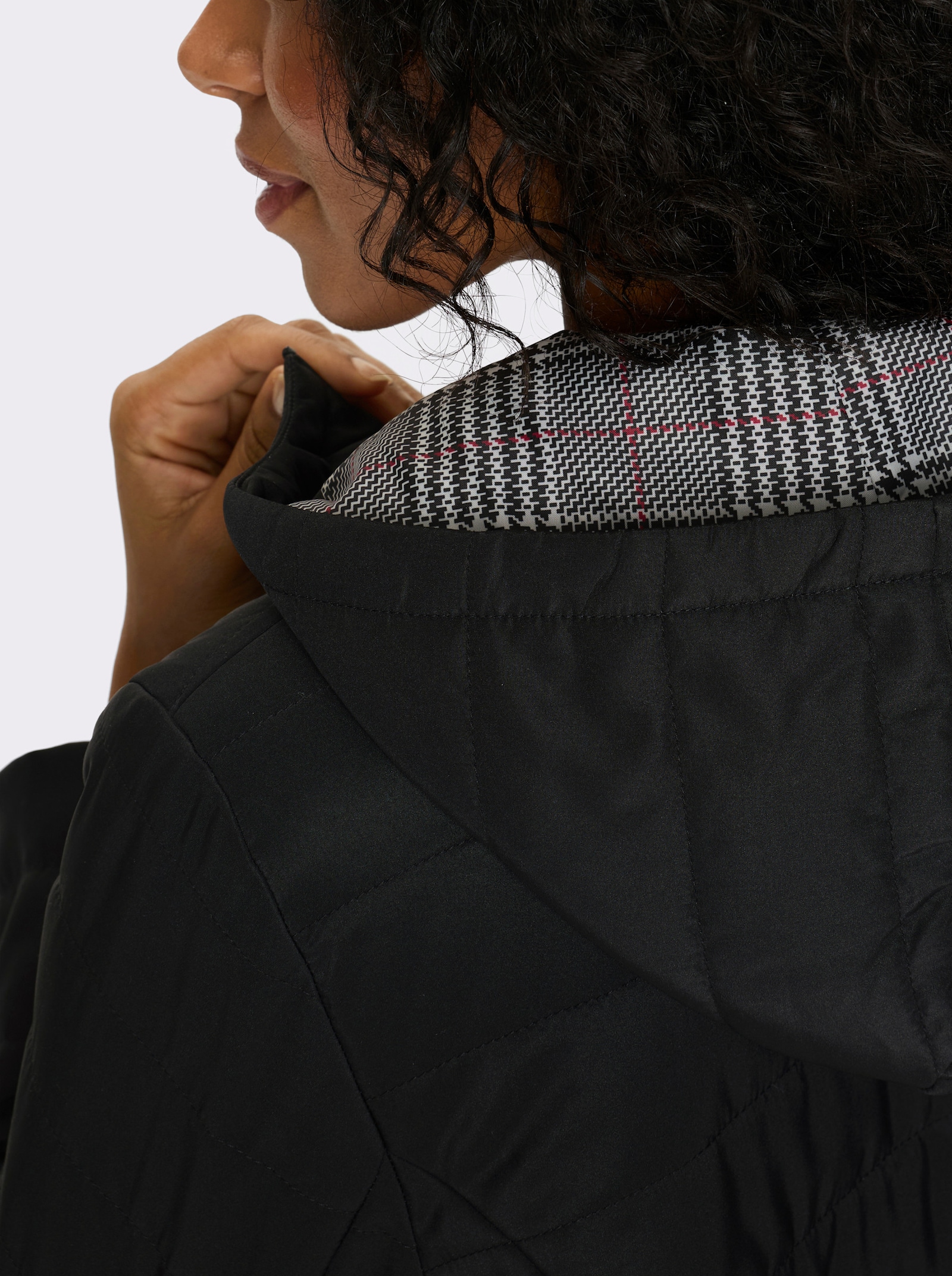 Steppjacke mit bedrucktem Futter - schwarz