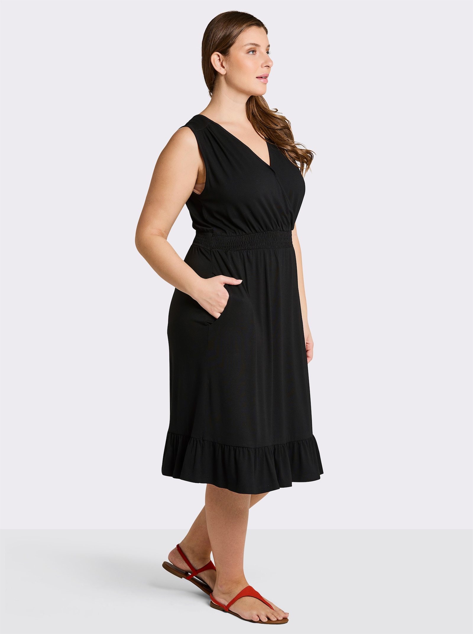 sheego Jerseykleid in Wickeloptik - schwarz