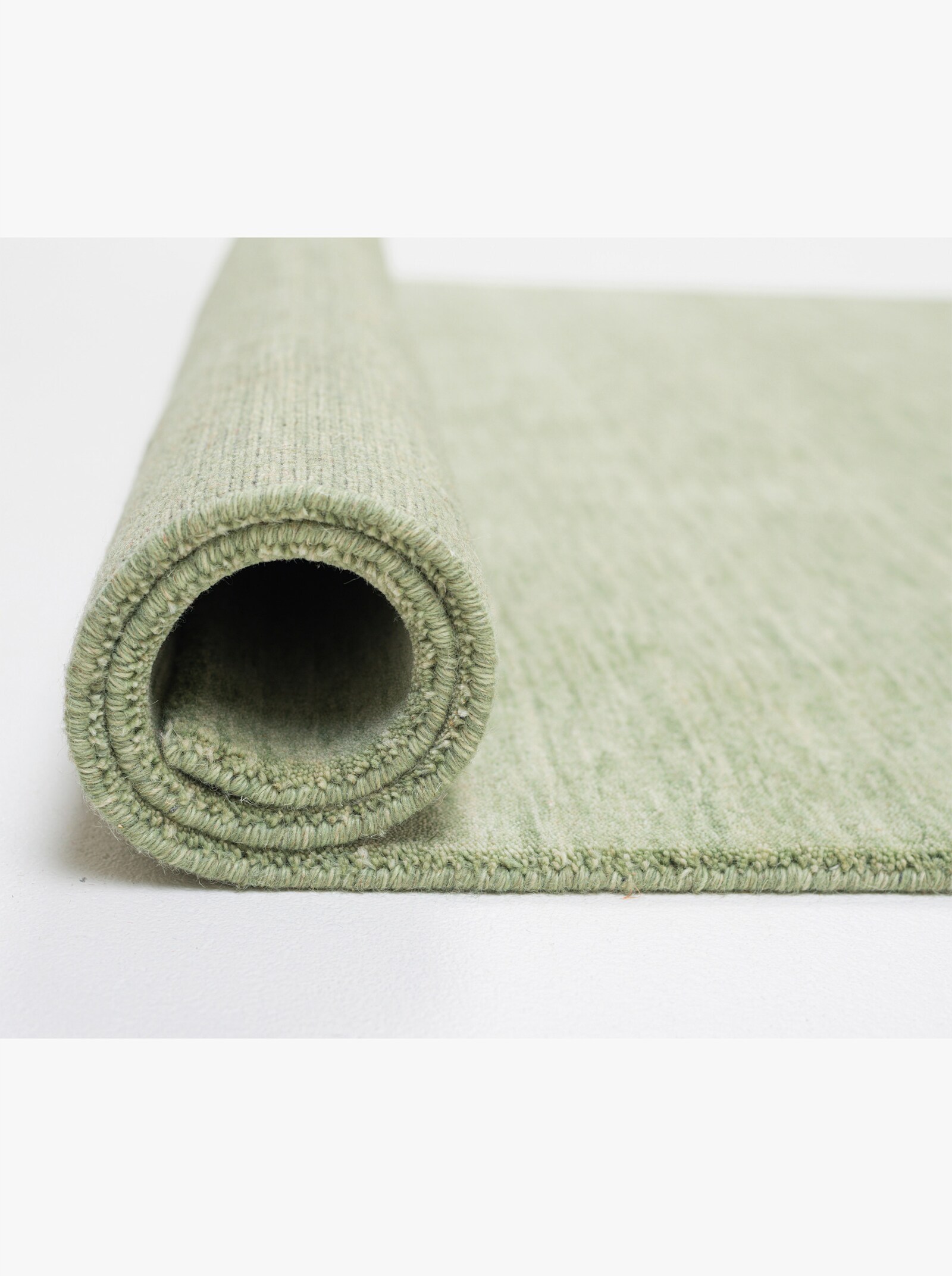 Theko Handwebteppich - hellgrün