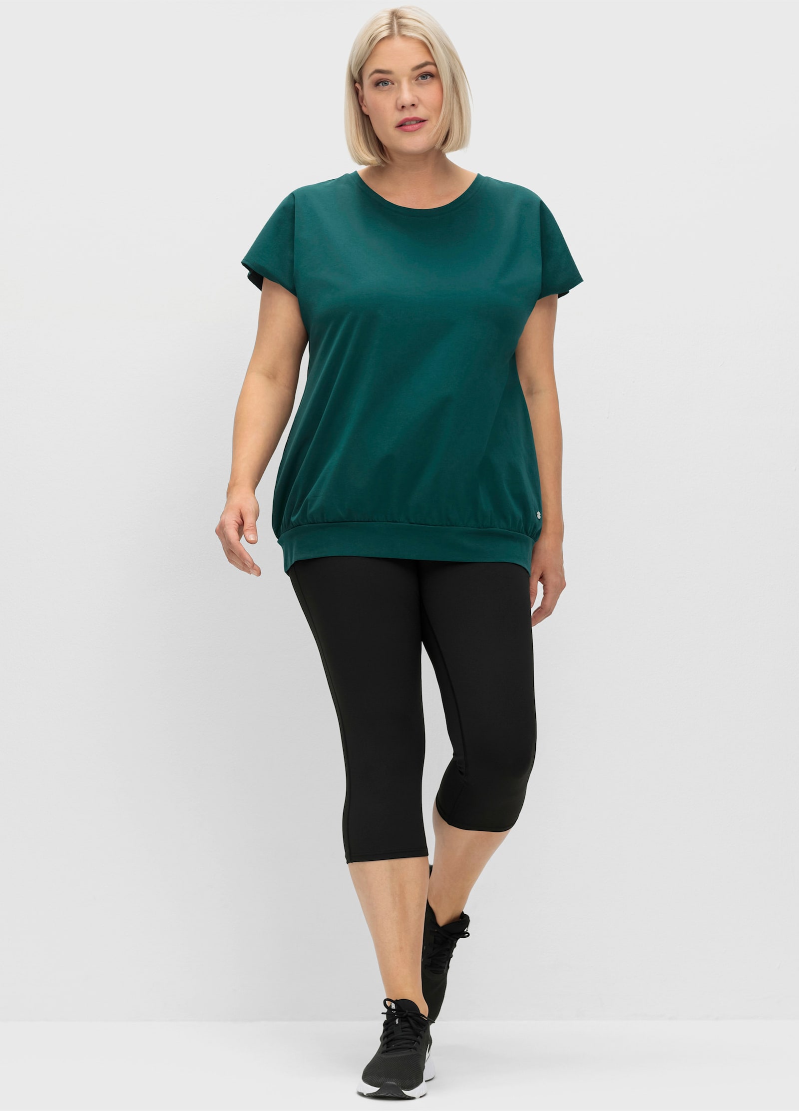 sheego Funktionsshirt mit Cut-out im Nacken - petrol