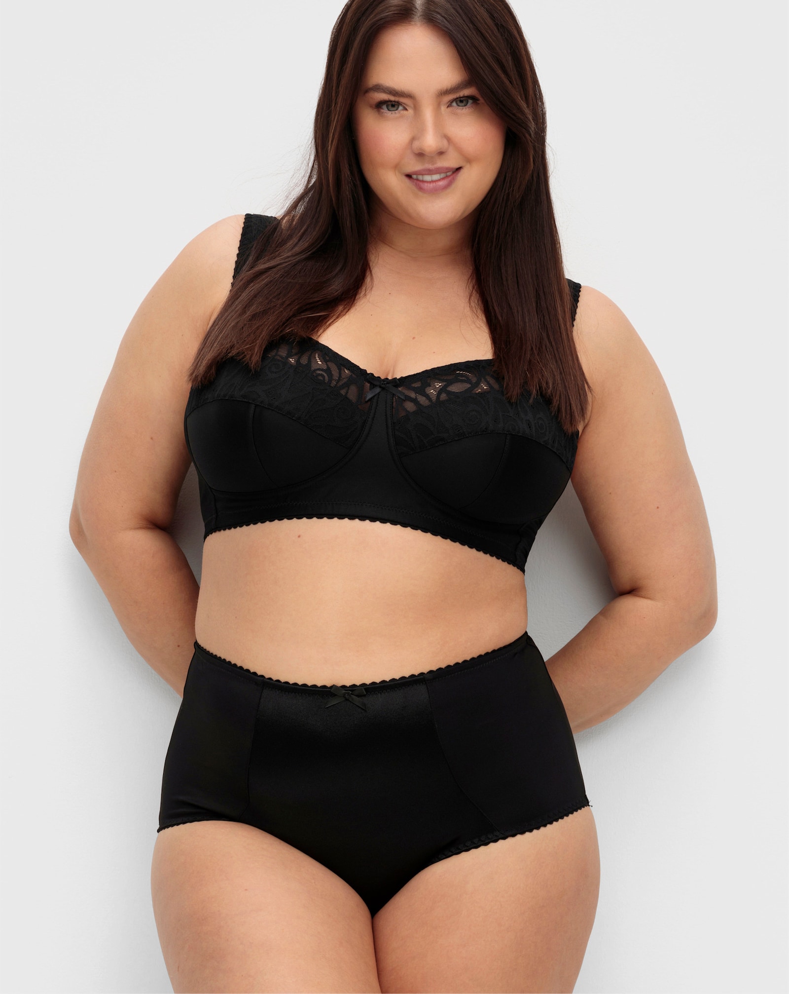 sheego Entlastungs-BH ohne Bügel mit transparenter Spitze - schwarz