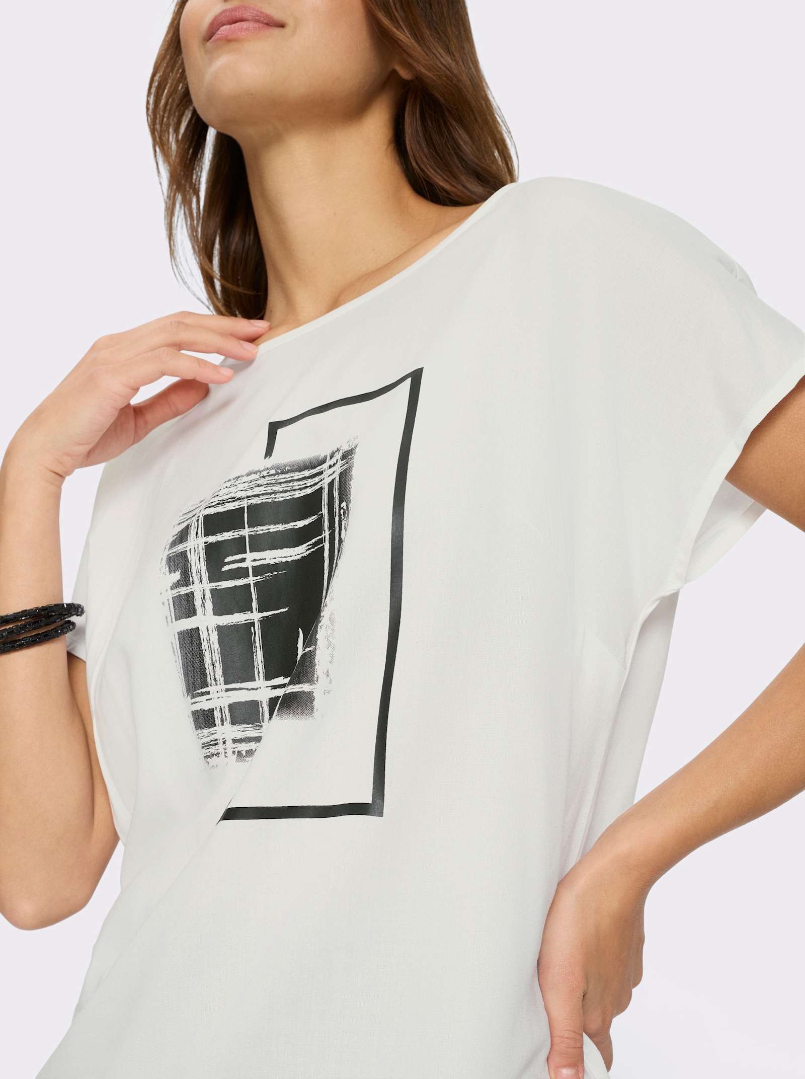 Schlupfbluse mit überschnittenen Schultern - weiß-schwarz-bedruckt