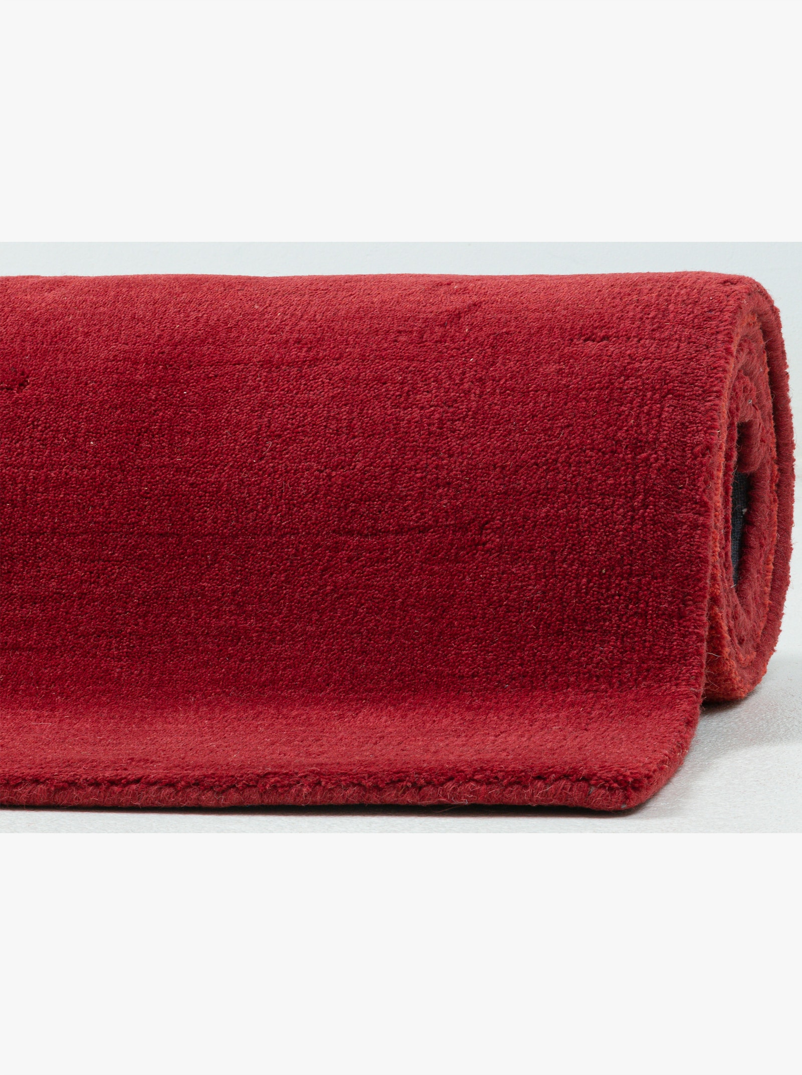 Theko Handwebteppich - rot