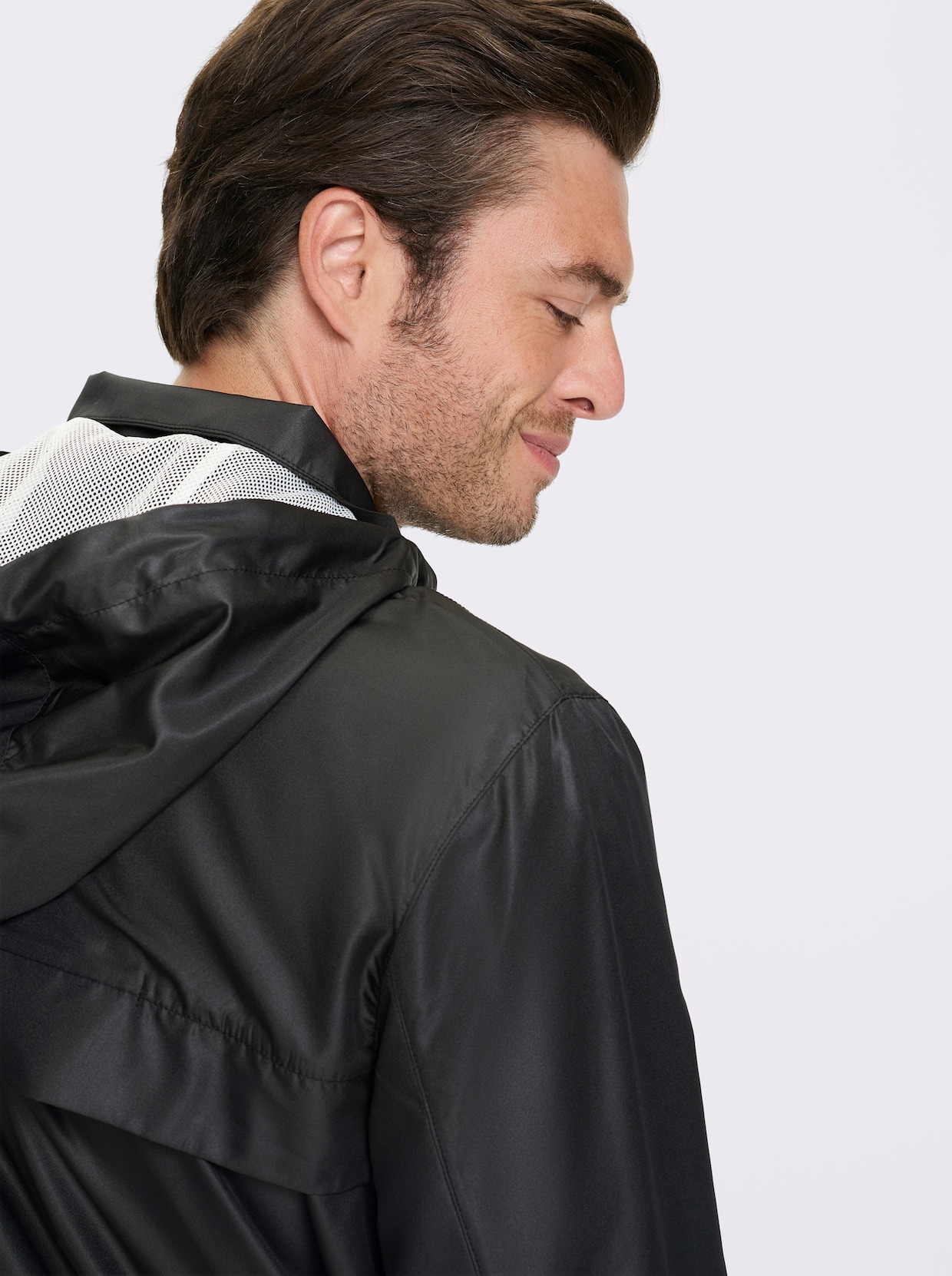 Catamaran Sports Funktionsjacke mit Belüftungsschlitzen hinten - schwarz