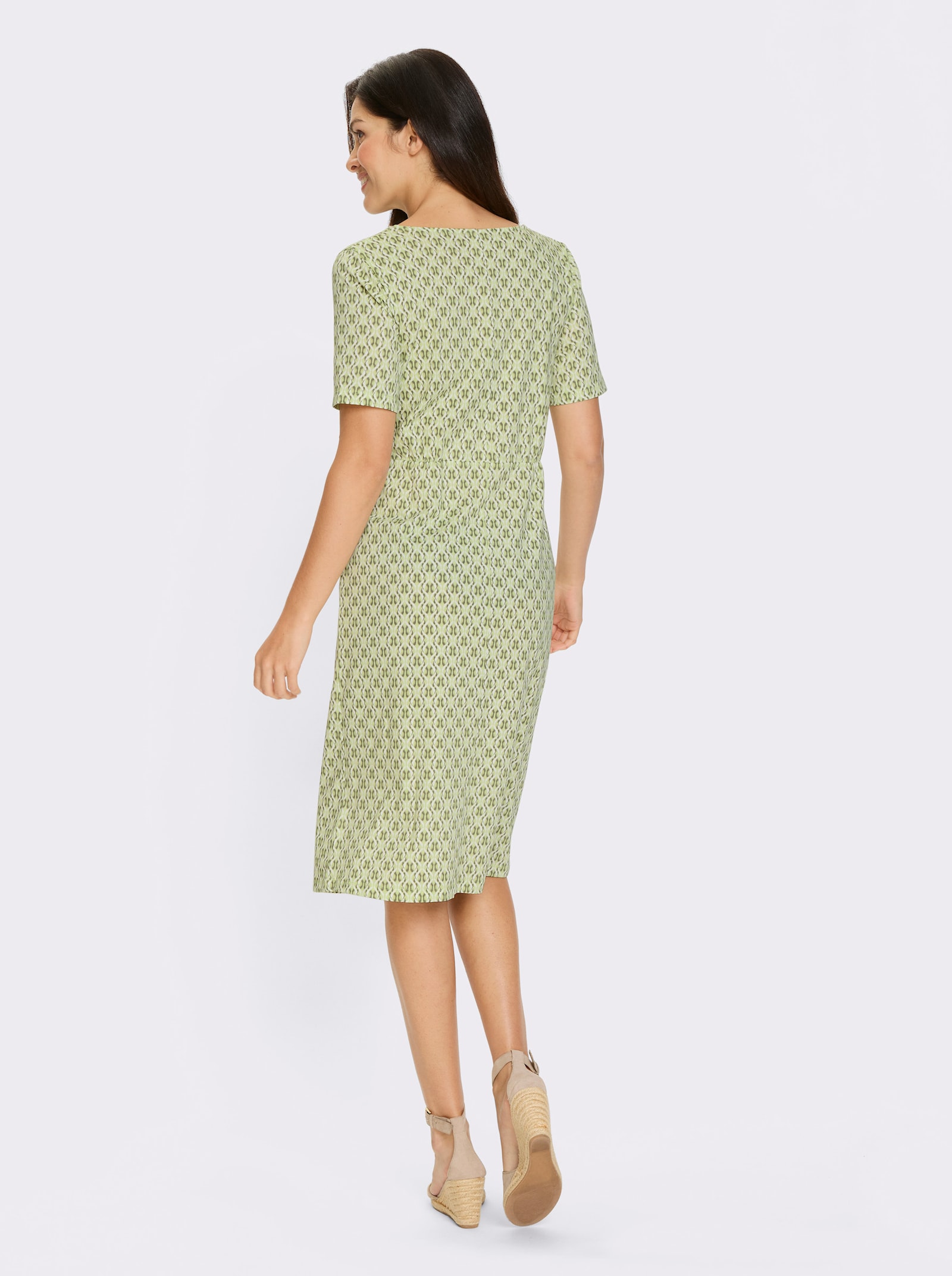 Jerseyjurk met zakken - pistache/kaki bedrukt