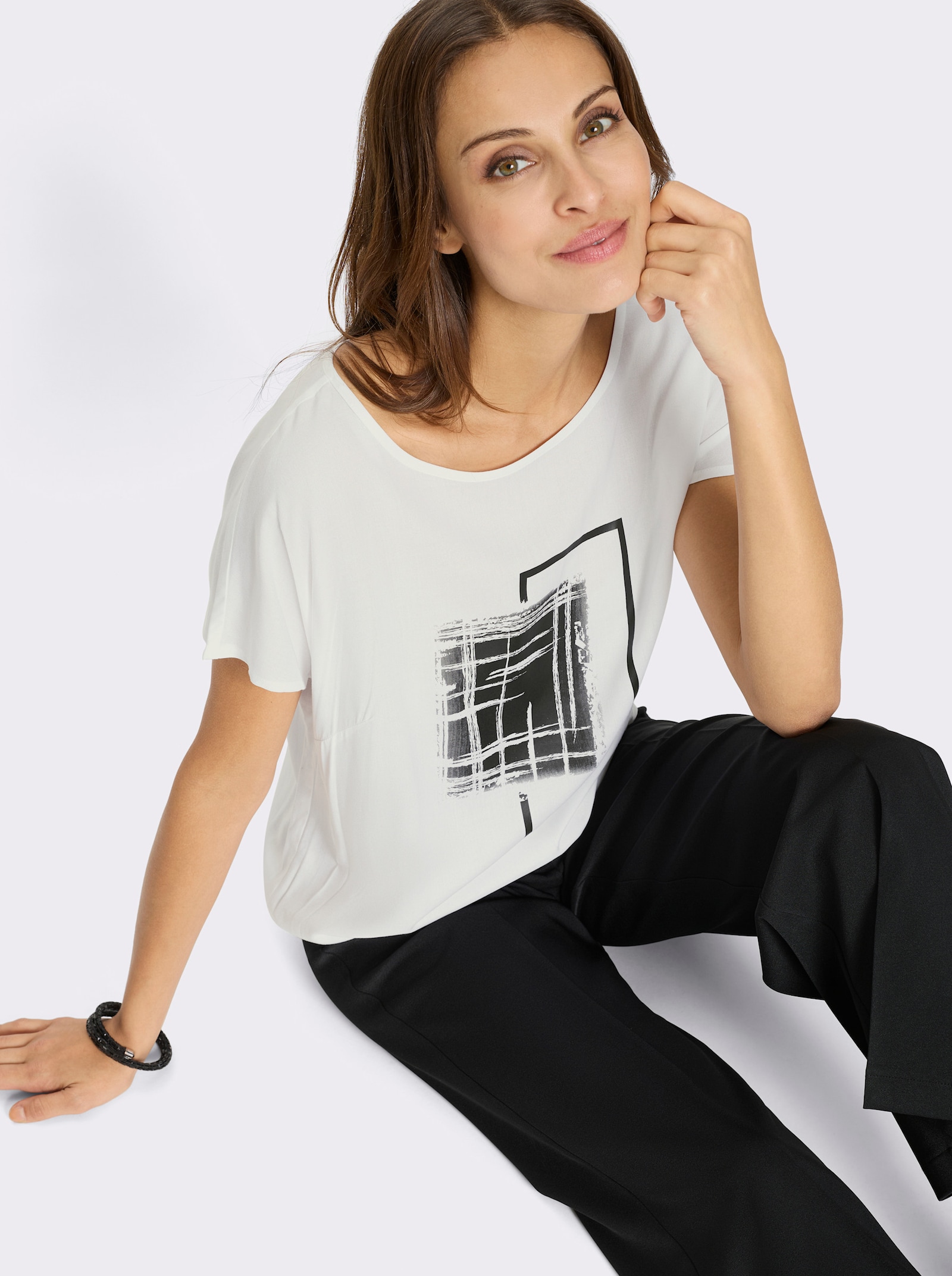 Schlupfbluse mit überschnittenen Schultern - weiß-schwarz-bedruckt