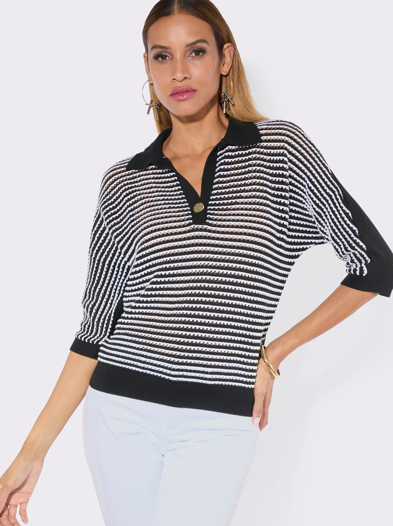 Polopullover mit Lochstickerei vorne - schwarz-weiß-gemustert