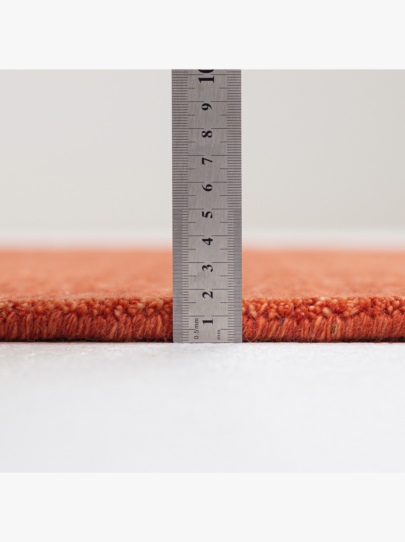 Theko Handwebteppich - orange