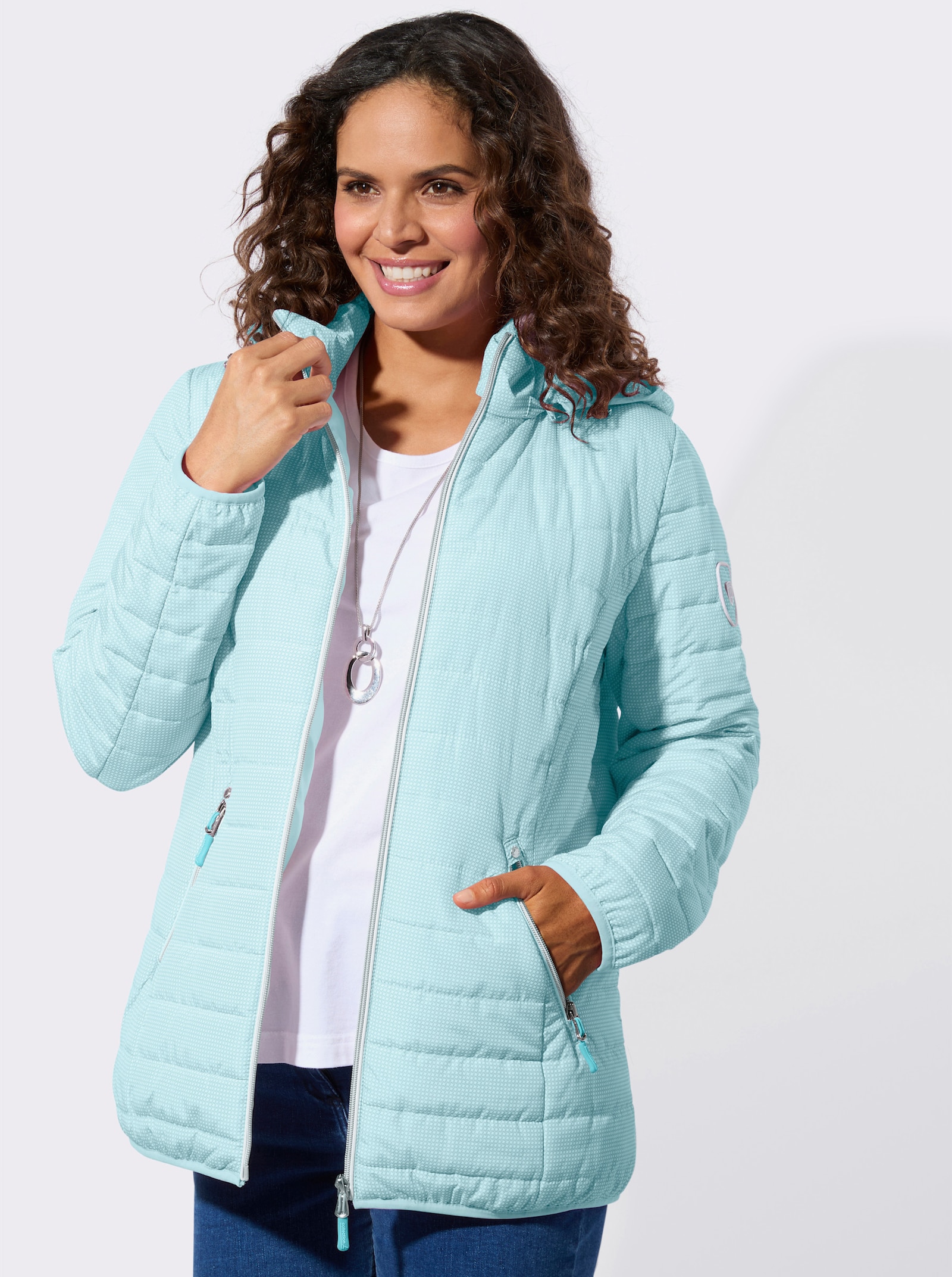 Gewatteerde jas met afneembare capuchon - mint/wit bedrukt