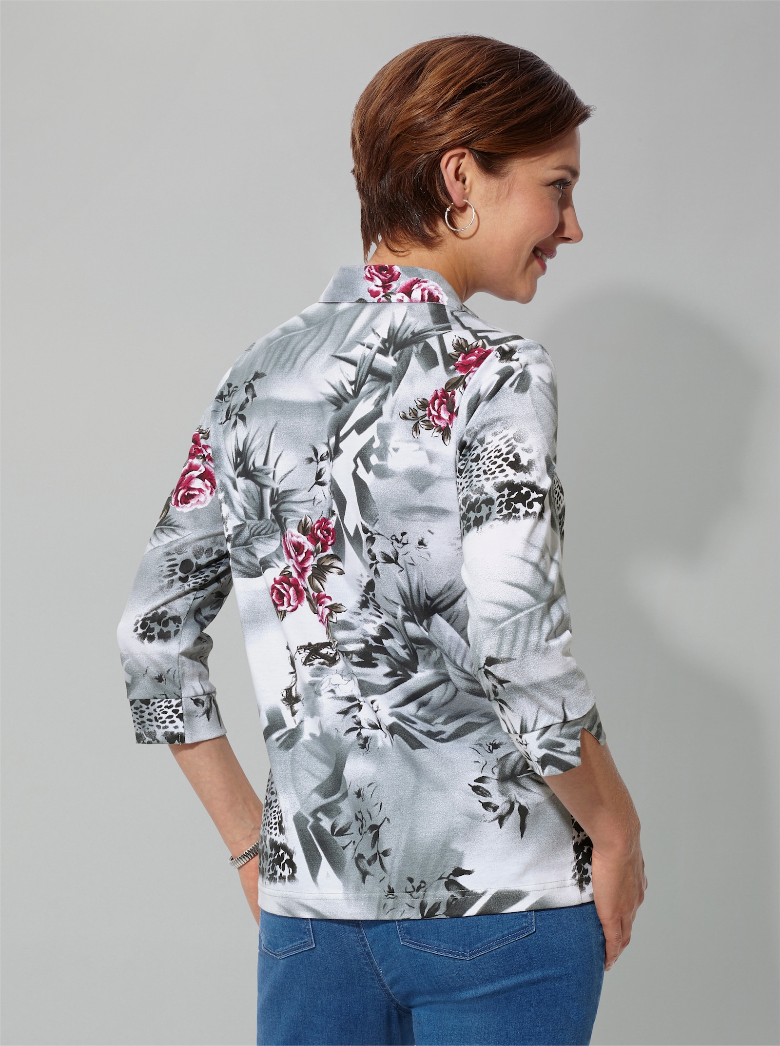 Poloshirt met dierenvacht en bloemenprint - fuchsia gedessineerd
